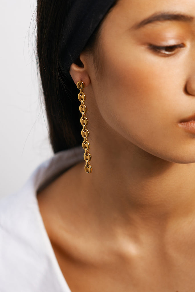 Cropped view on model of Onia Drop Earrings Earrings Bagatiba 