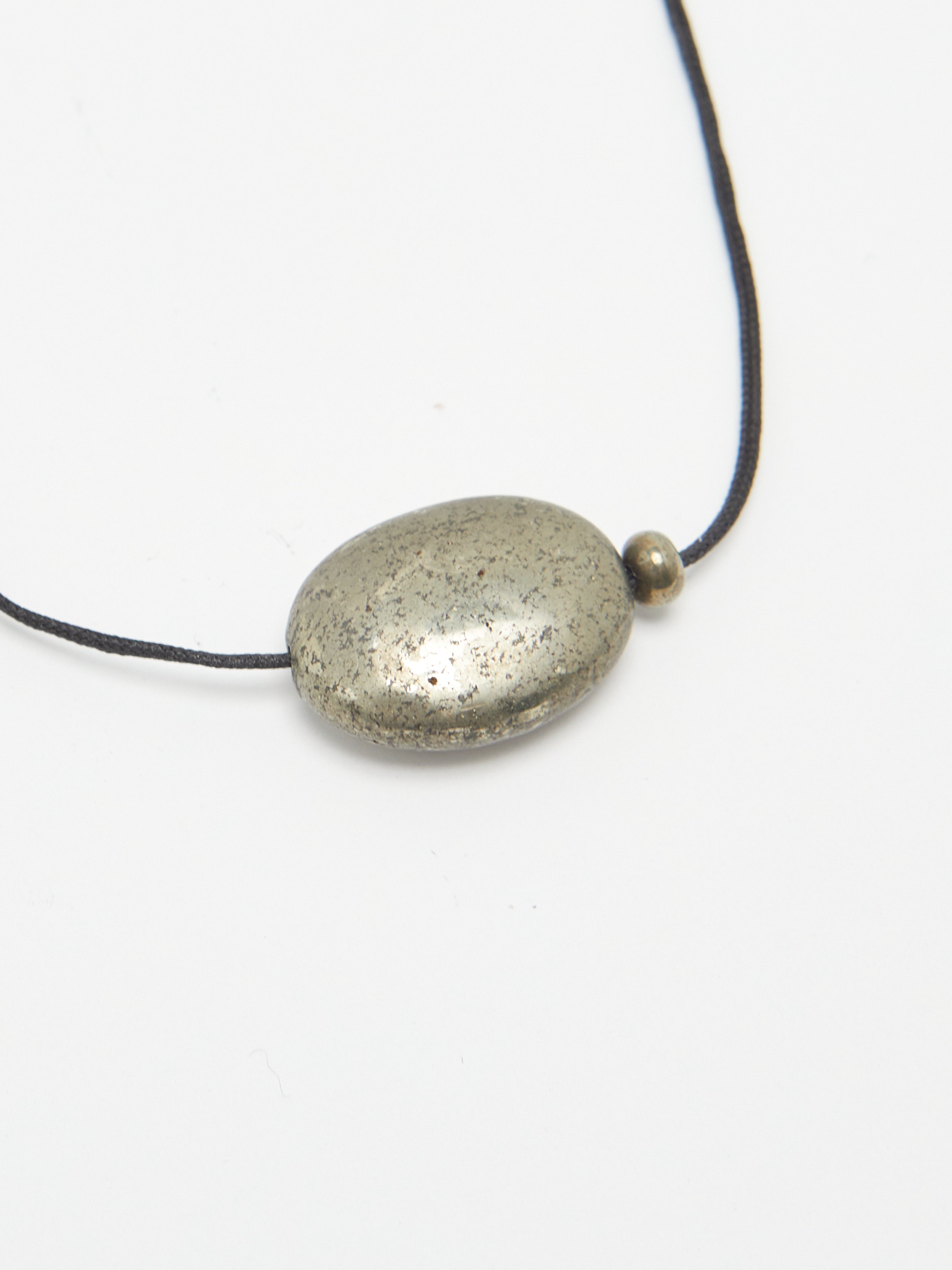 Oval Pyrite Necklace necklace flat lay