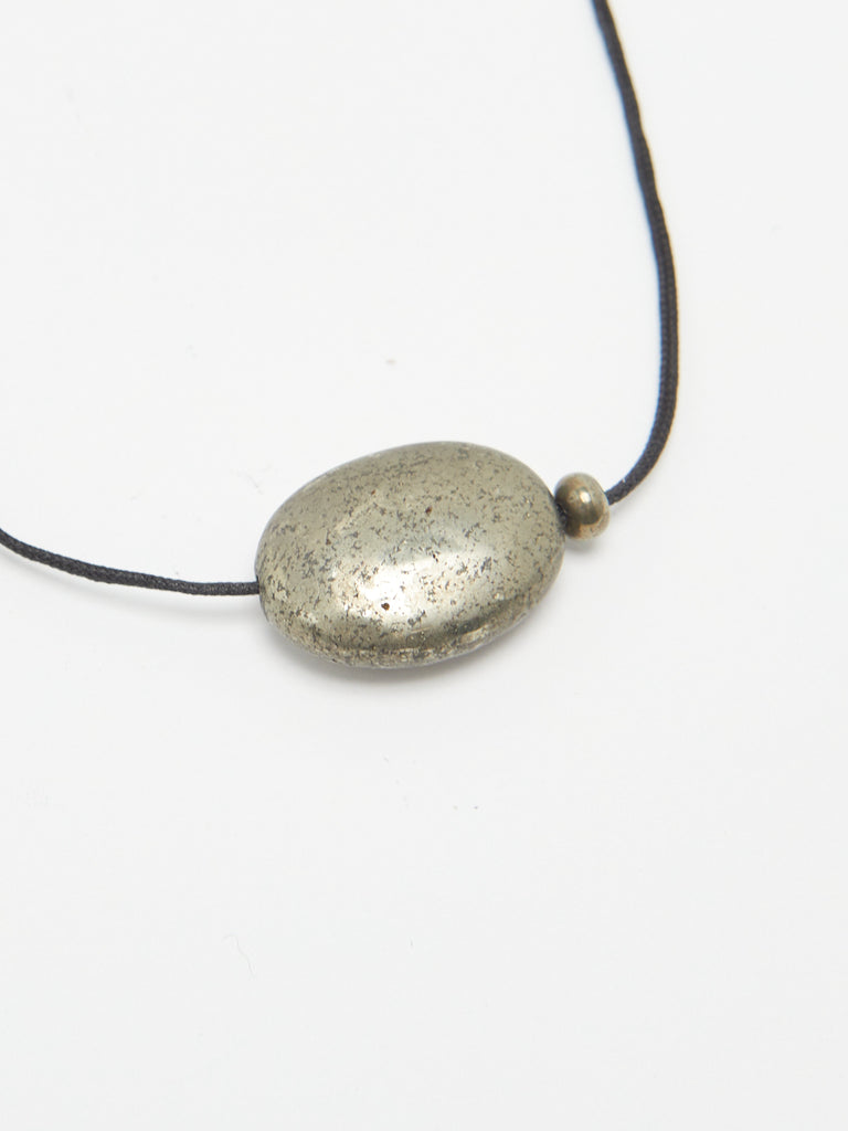 Oval Pyrite Necklace necklace flat lay