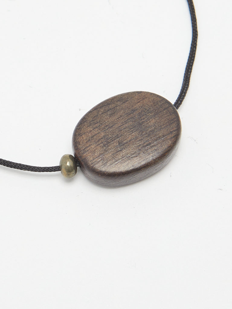 Oval Wood Bead Necklace necklace flat lay close up