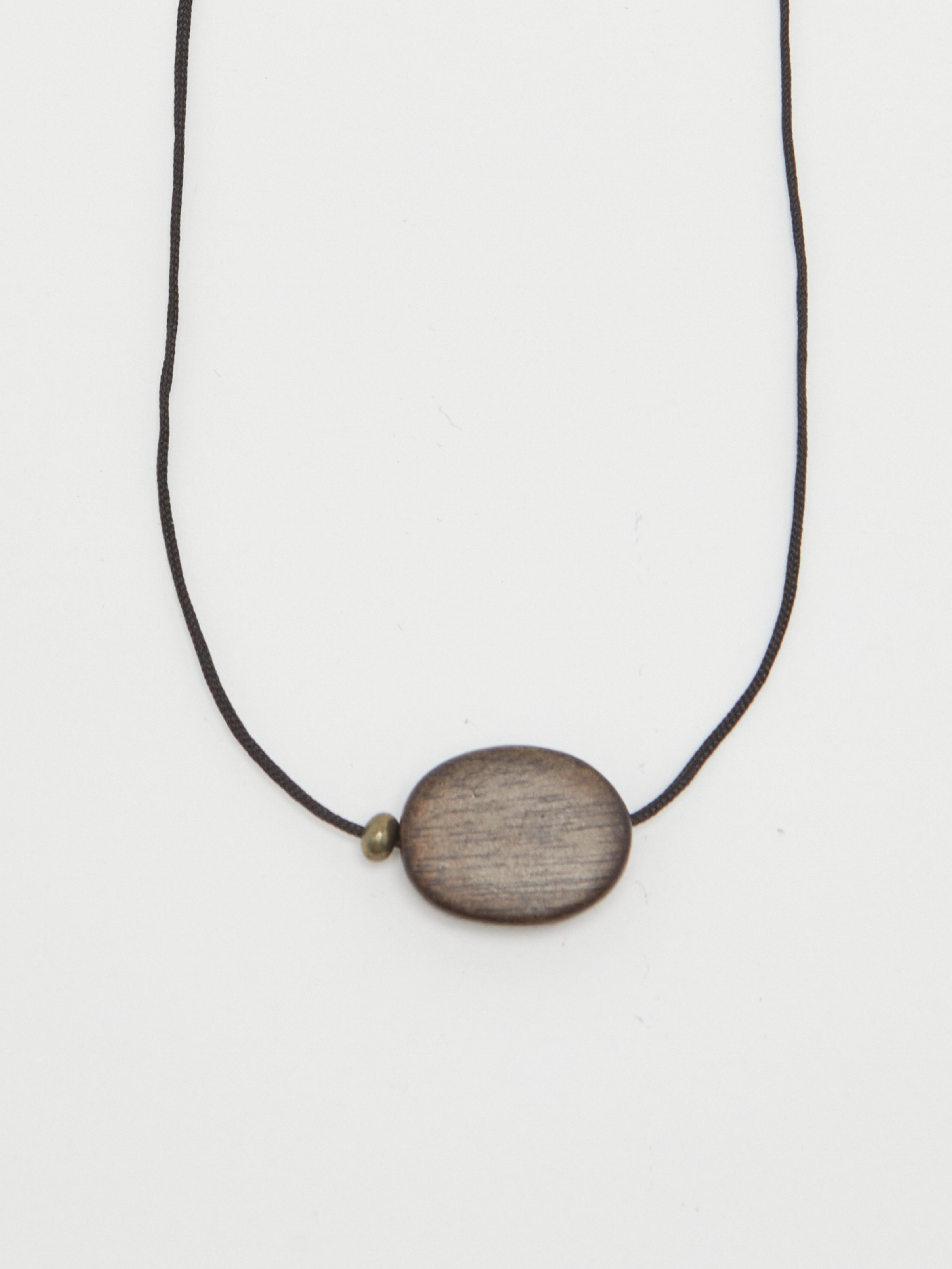 Oval Wood Bead Necklace necklace close up flat lay