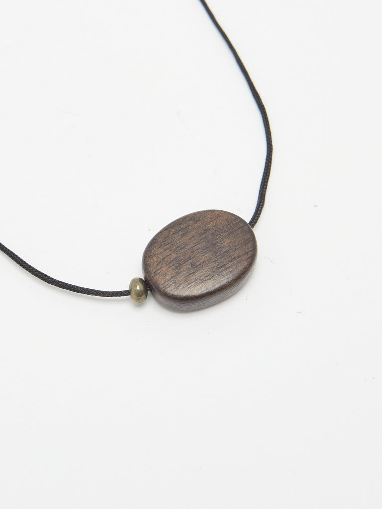 Oval Wood Bead Necklace necklace Bagatiba close up flat lay side view