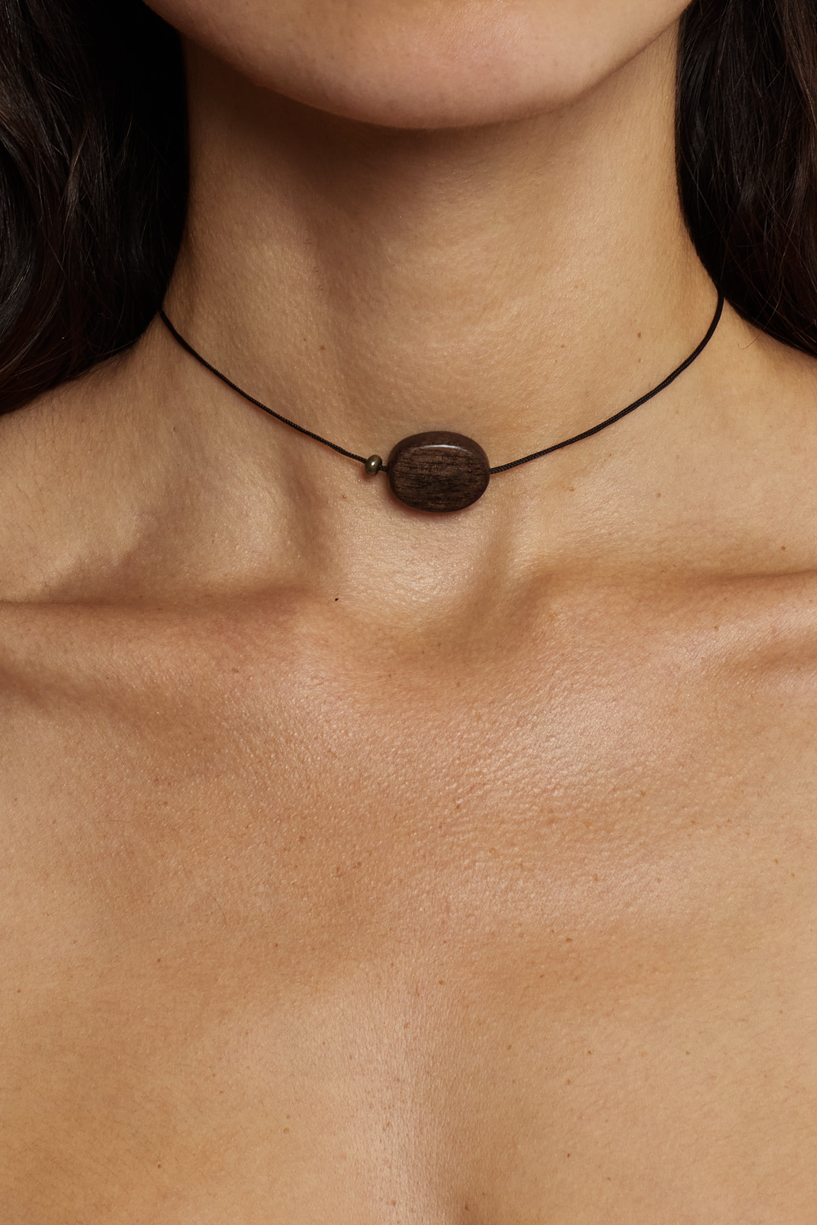 Oval Wood Bead Necklace necklace close up on skin