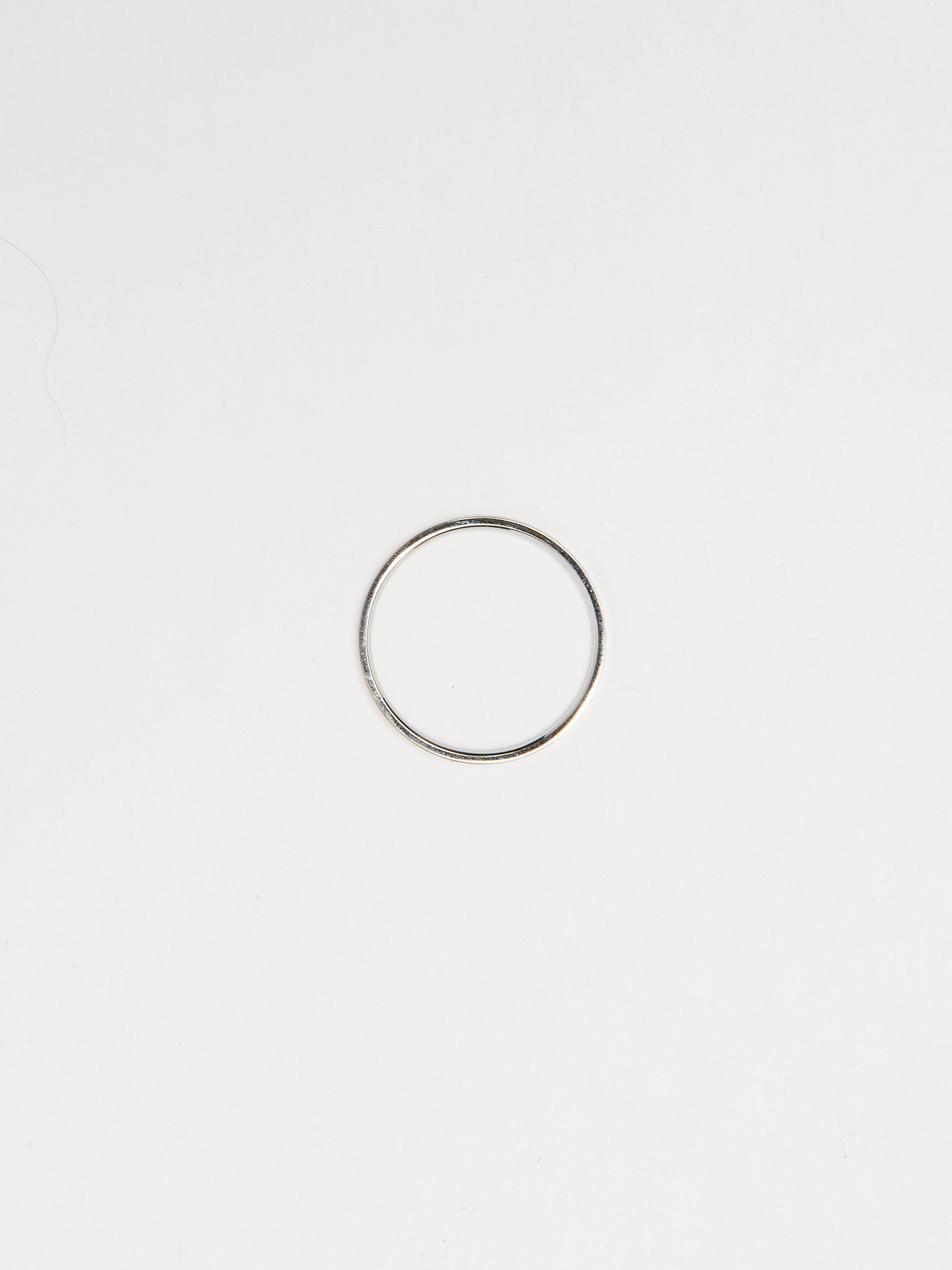 Full view flat lay Polished Silver Ring by Bagatiba 