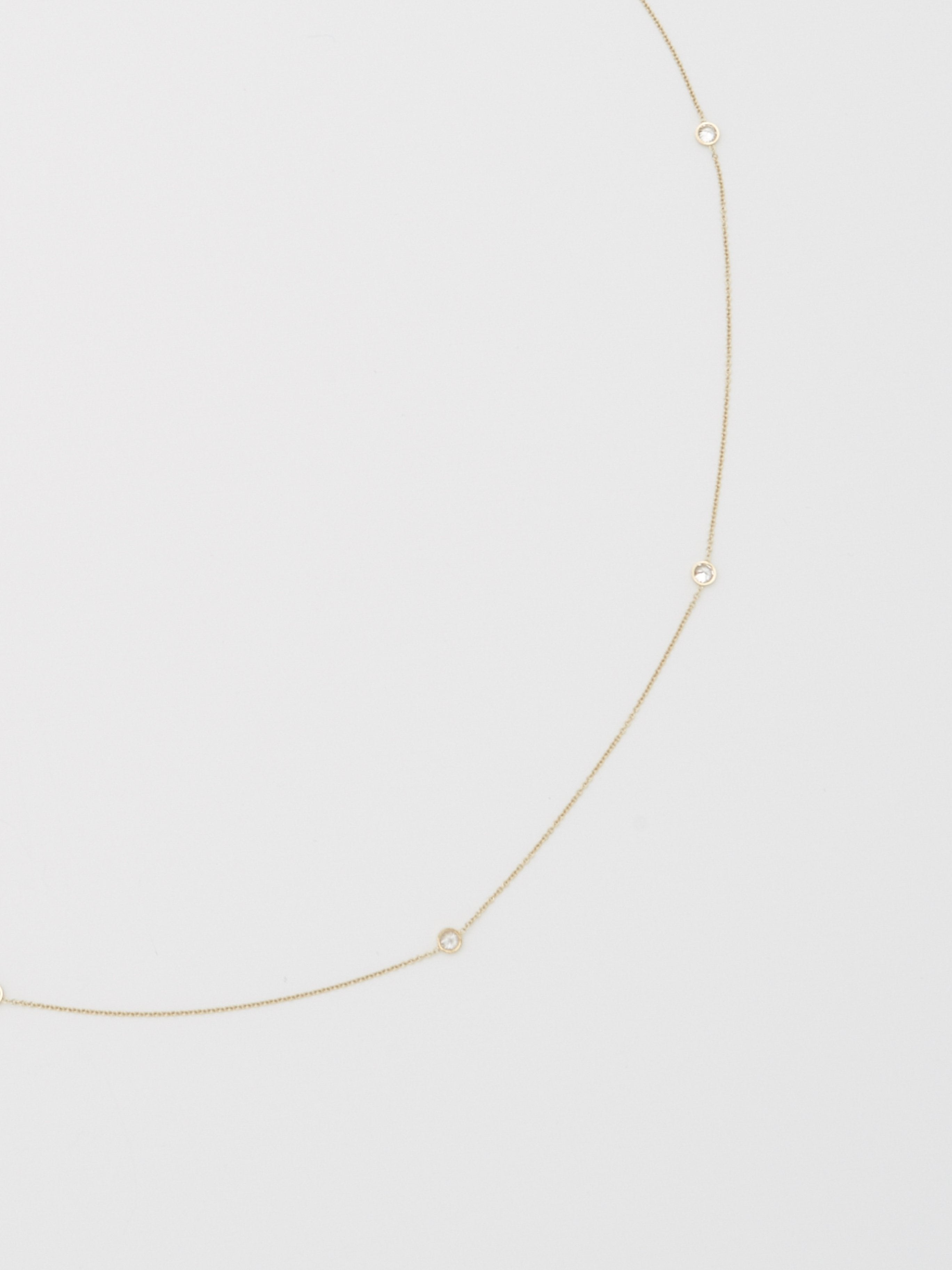 Cropped detail flat lay view of Princess Belly Chain Necklace Bagatiba 