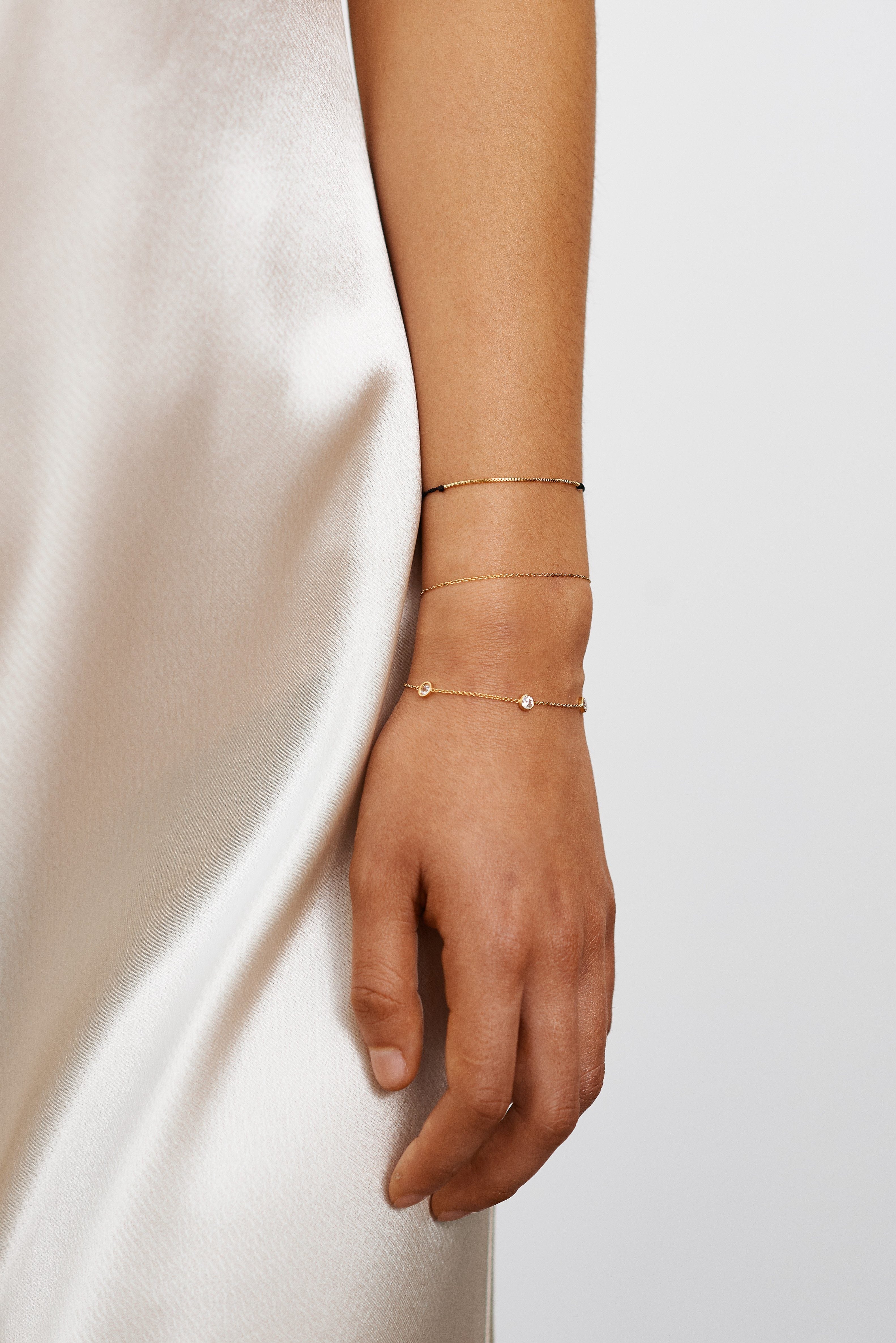 Detailed view of the Princess Bracelet by Bagatiba on model's wrist  