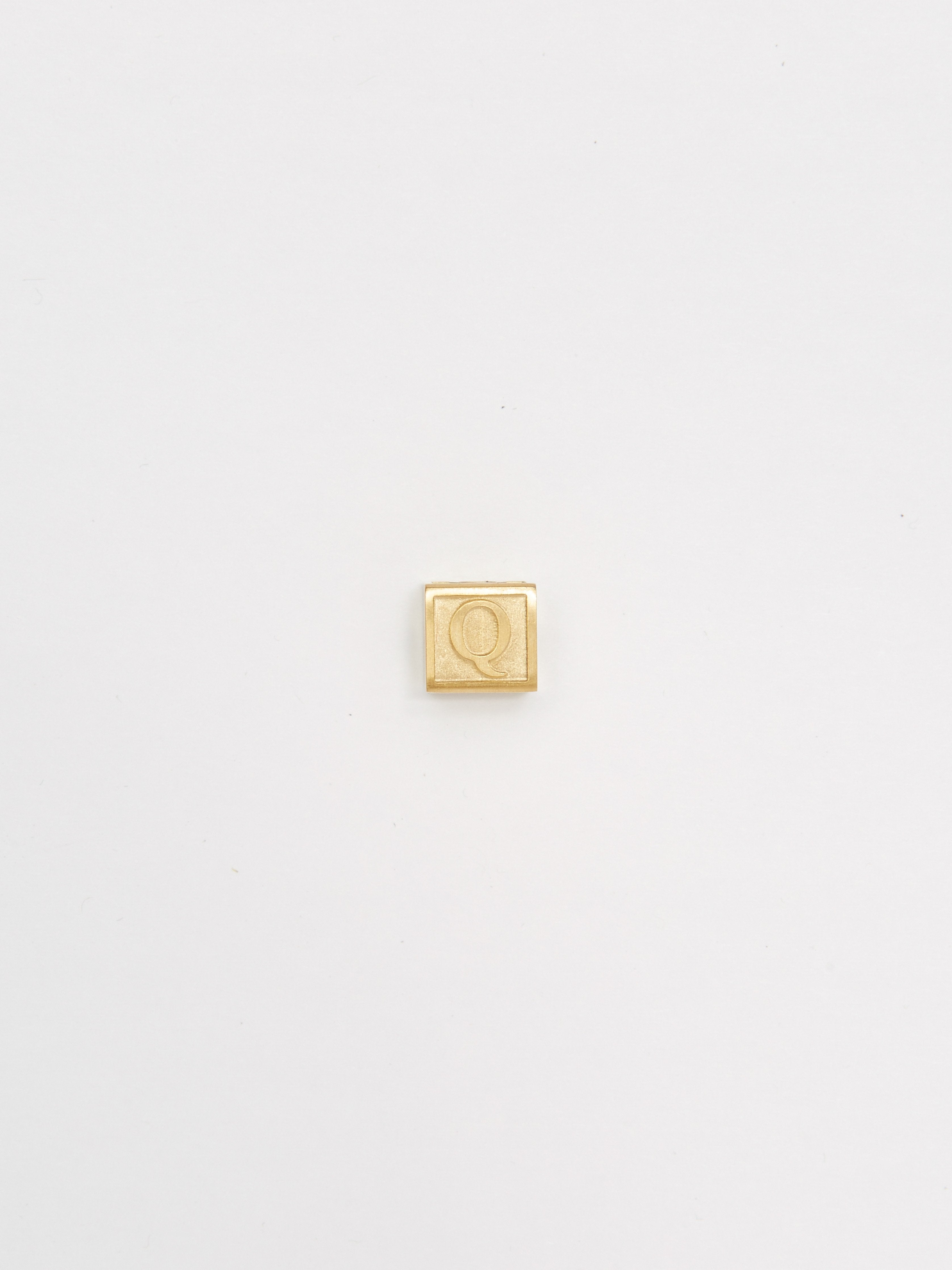 Full view flat lay of "Q" Letter Block letters Bagatiba 