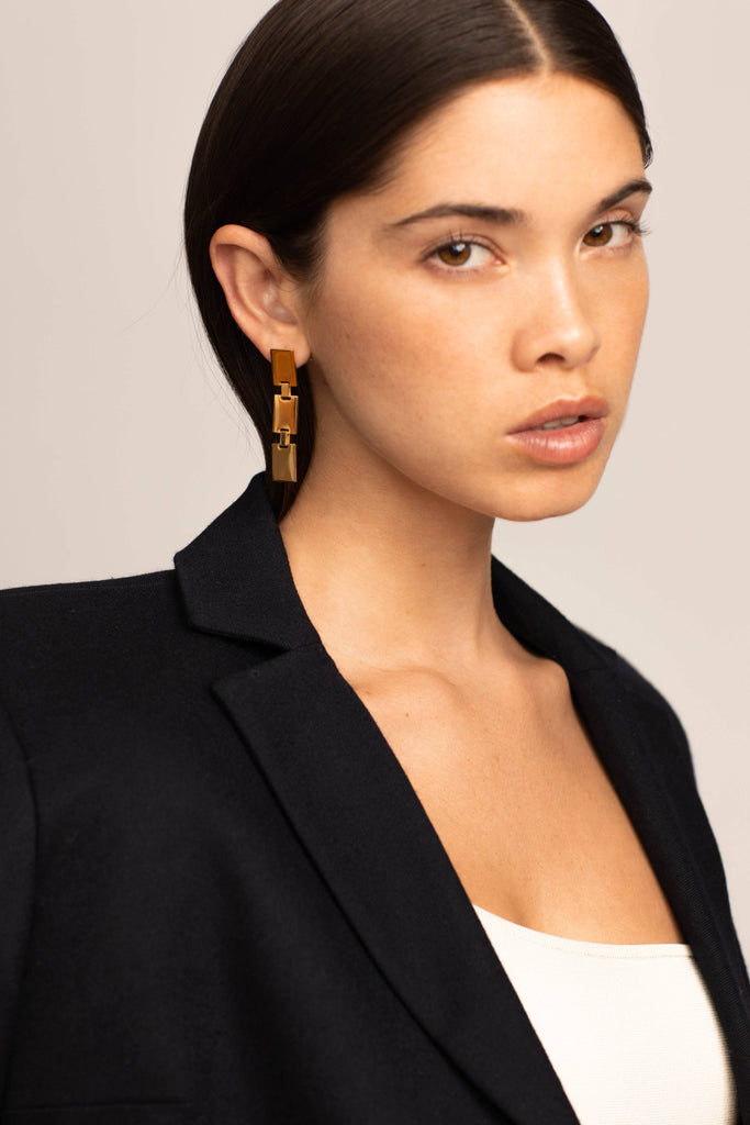 Model wearing Rectangle Dangle Earrings by Bagatiba 