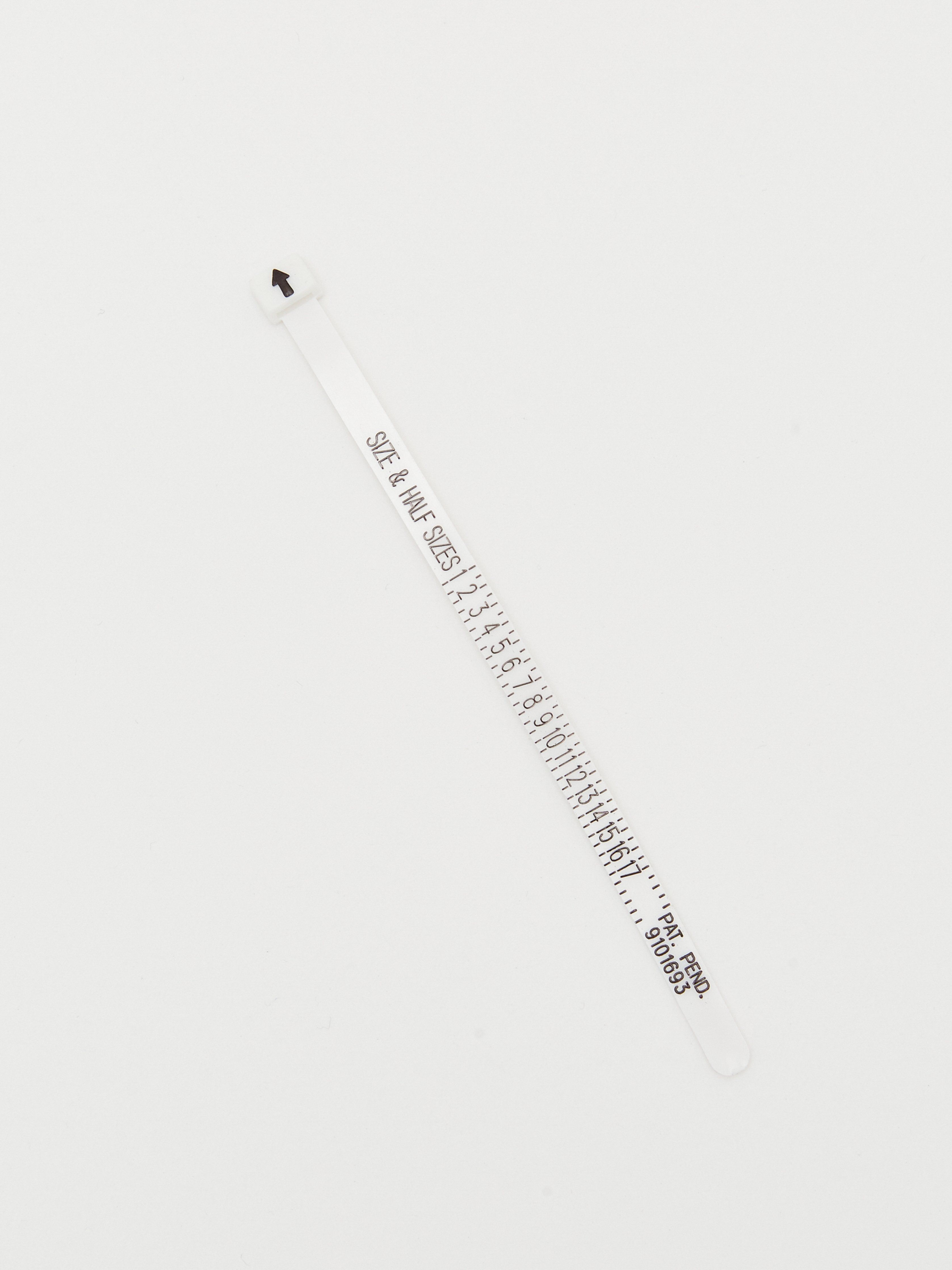 Flat lay view of Ring Sizer measurement stick Bagatiba 