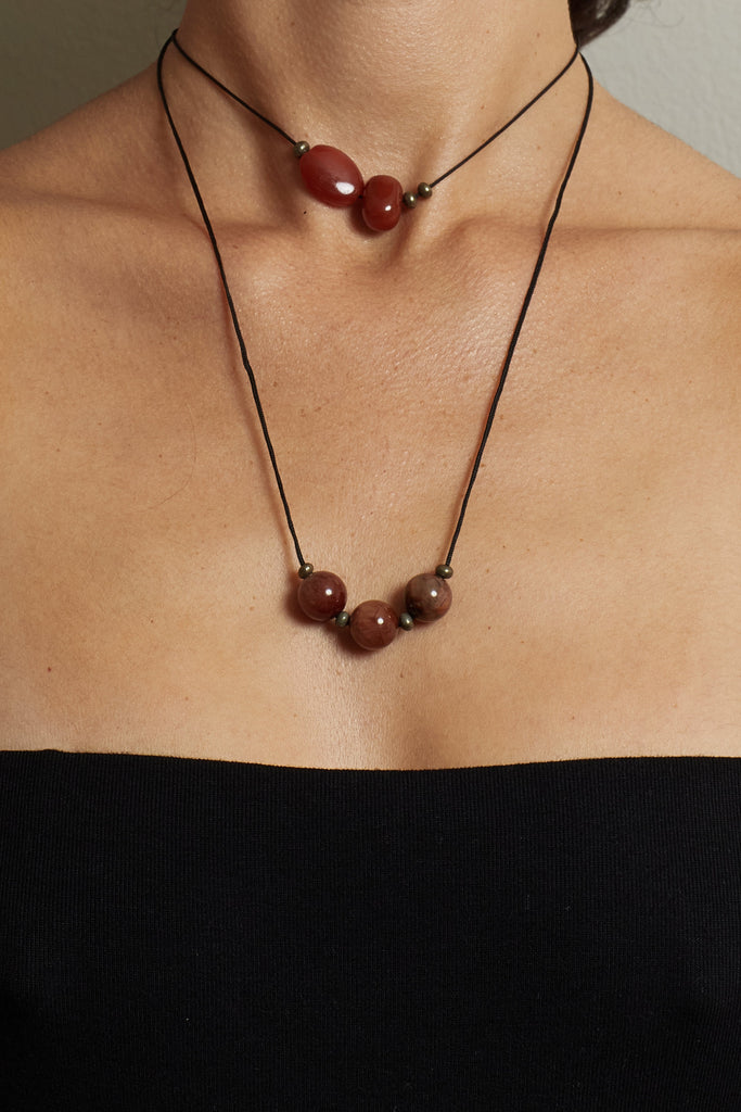 Rutilated Quartz Trio Necklace necklace Bagatiba on model close up of skin wearing double red agate and rutilated quartz