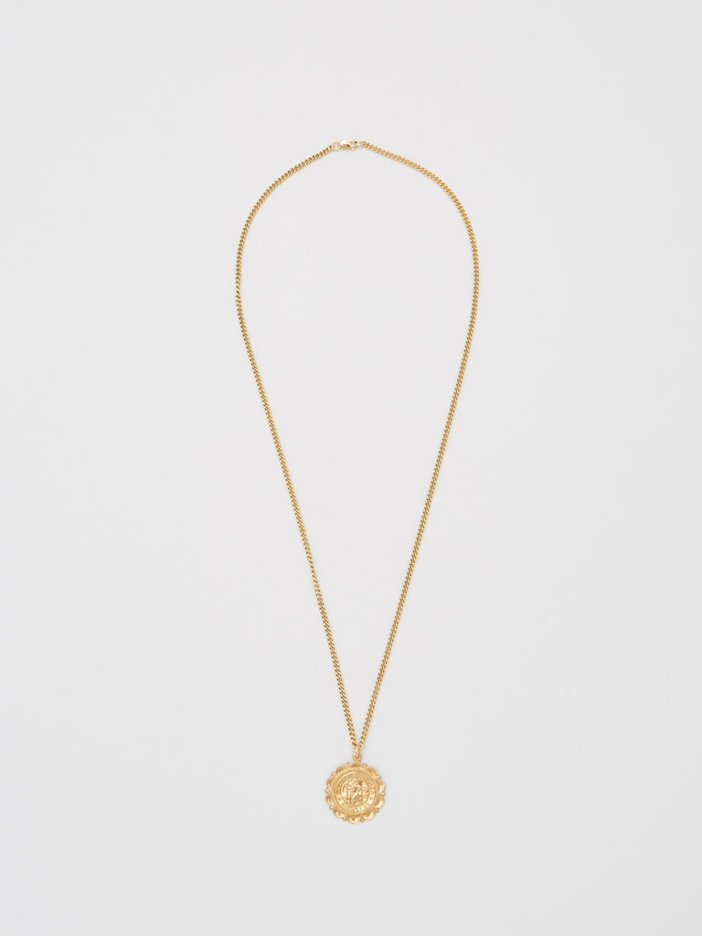 Full view flat lay of Saint Christopher Crest Necklace by Bagatiba 