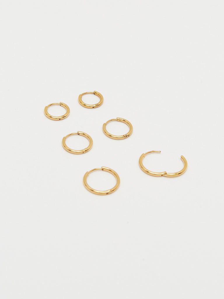 Detail view flat lay Set of Gold Eco Huggies Earrings Bagatiba 