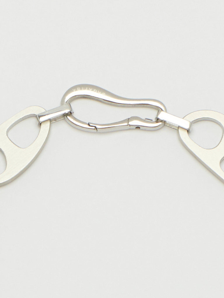 Detailed view flat lay of Silver Brushed Tab Bracelet by bagatiba 
