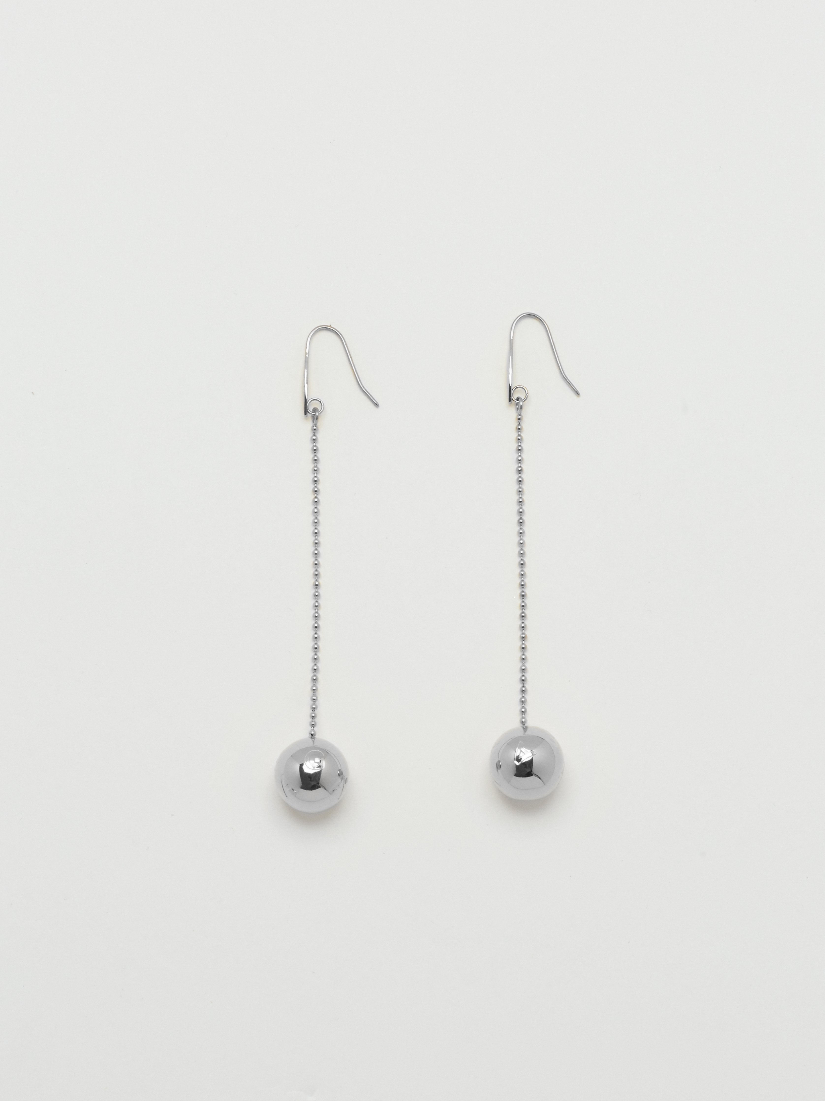 Full view flat lay of Silver Drop Sphere Earrings by bagatiba 