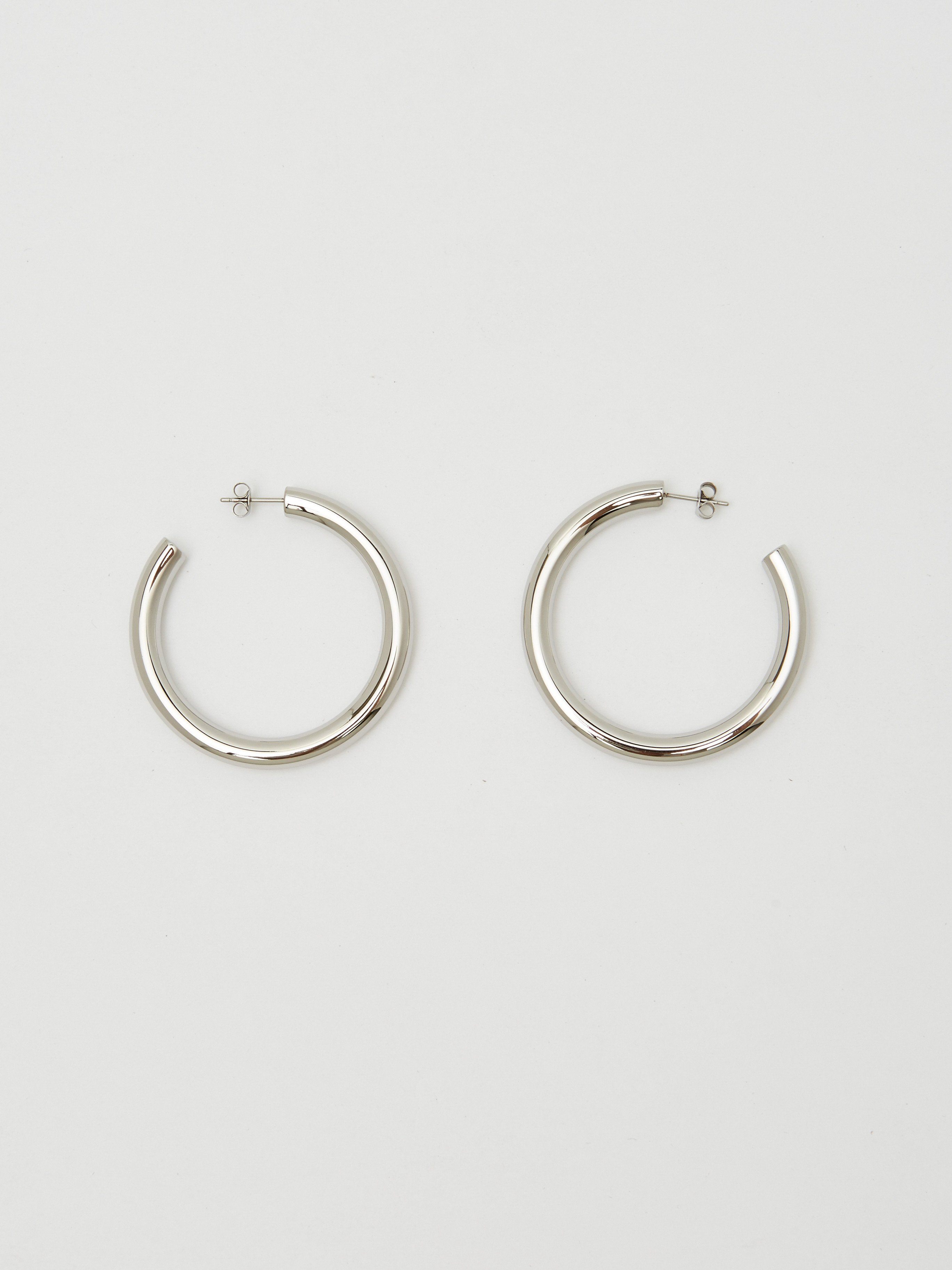 Full view flat lay of Silver Hollow Hoops Earrings Bagatiba 