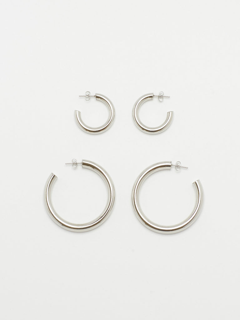 Full view flat lay of Silver Hollow Hoops and Mini Silver Hollow Hoops Earrings Bagatiba 