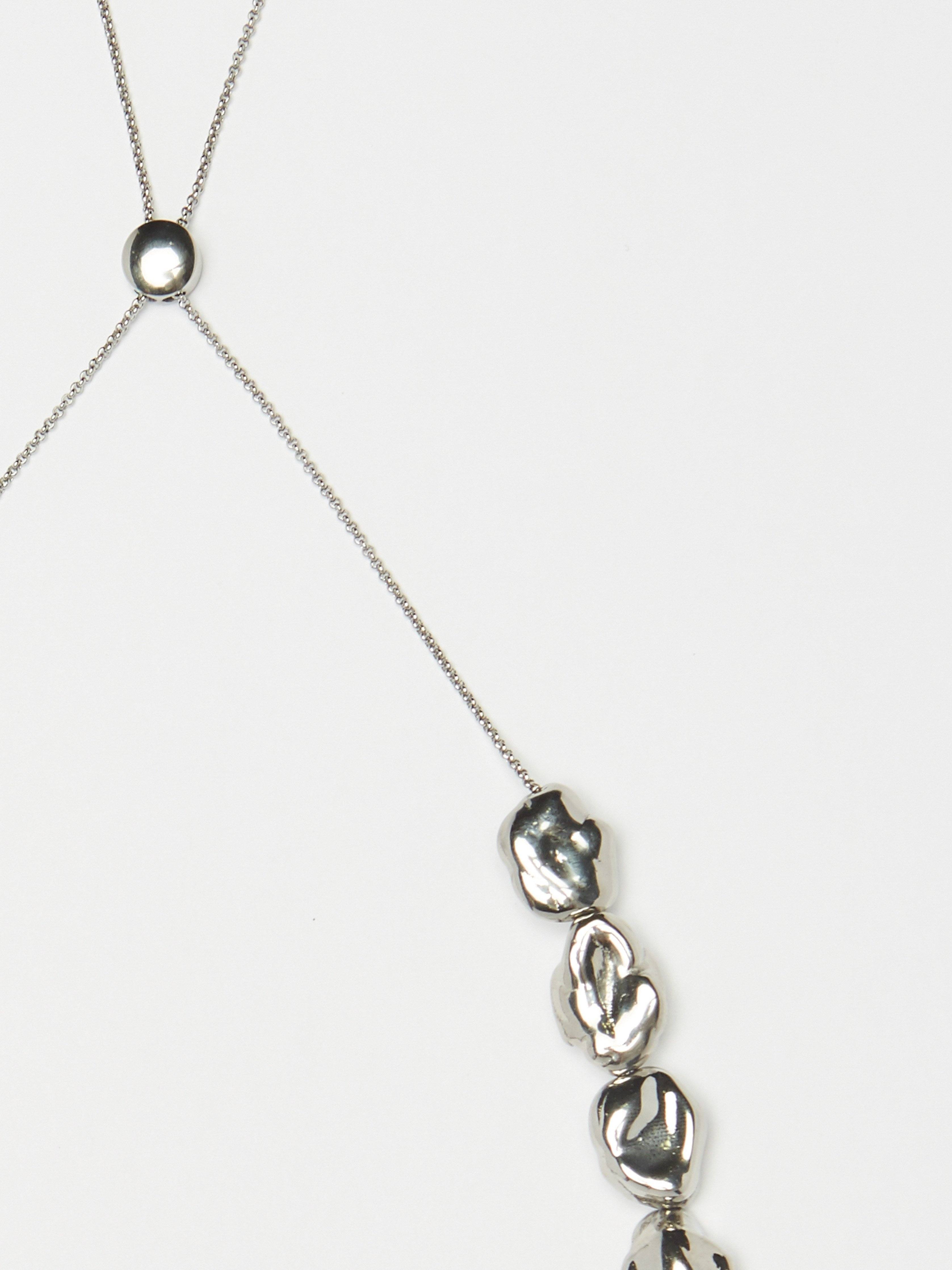 Cropped flat lay view of Silver Pearl Necklace Necklace bagatiba 