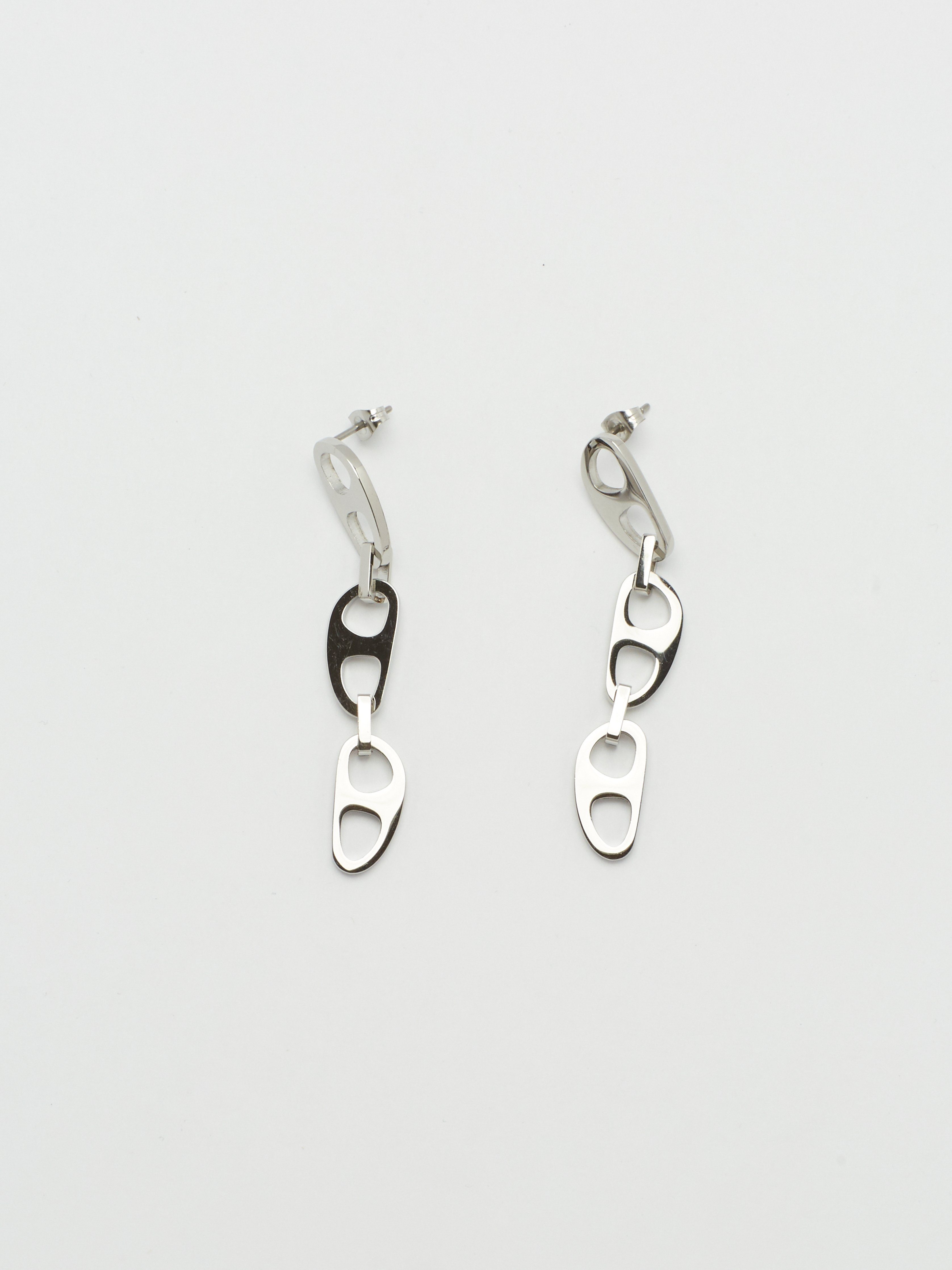 Detailed flat lay of Silver Tab Drop Earrings Earrings bagatiba 