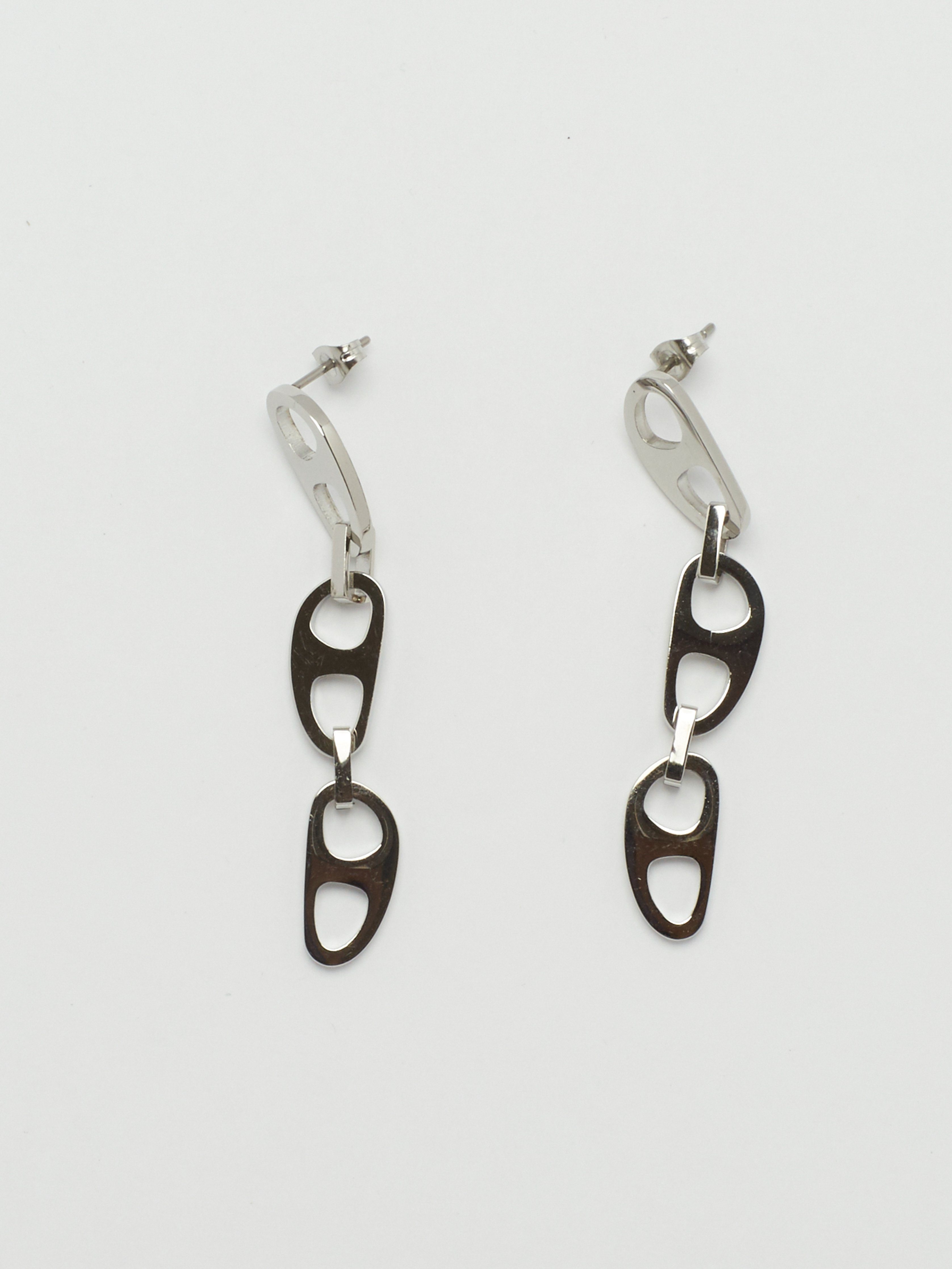 Detailed flat lay of Silver Tab Drop Earrings Earrings bagatiba 