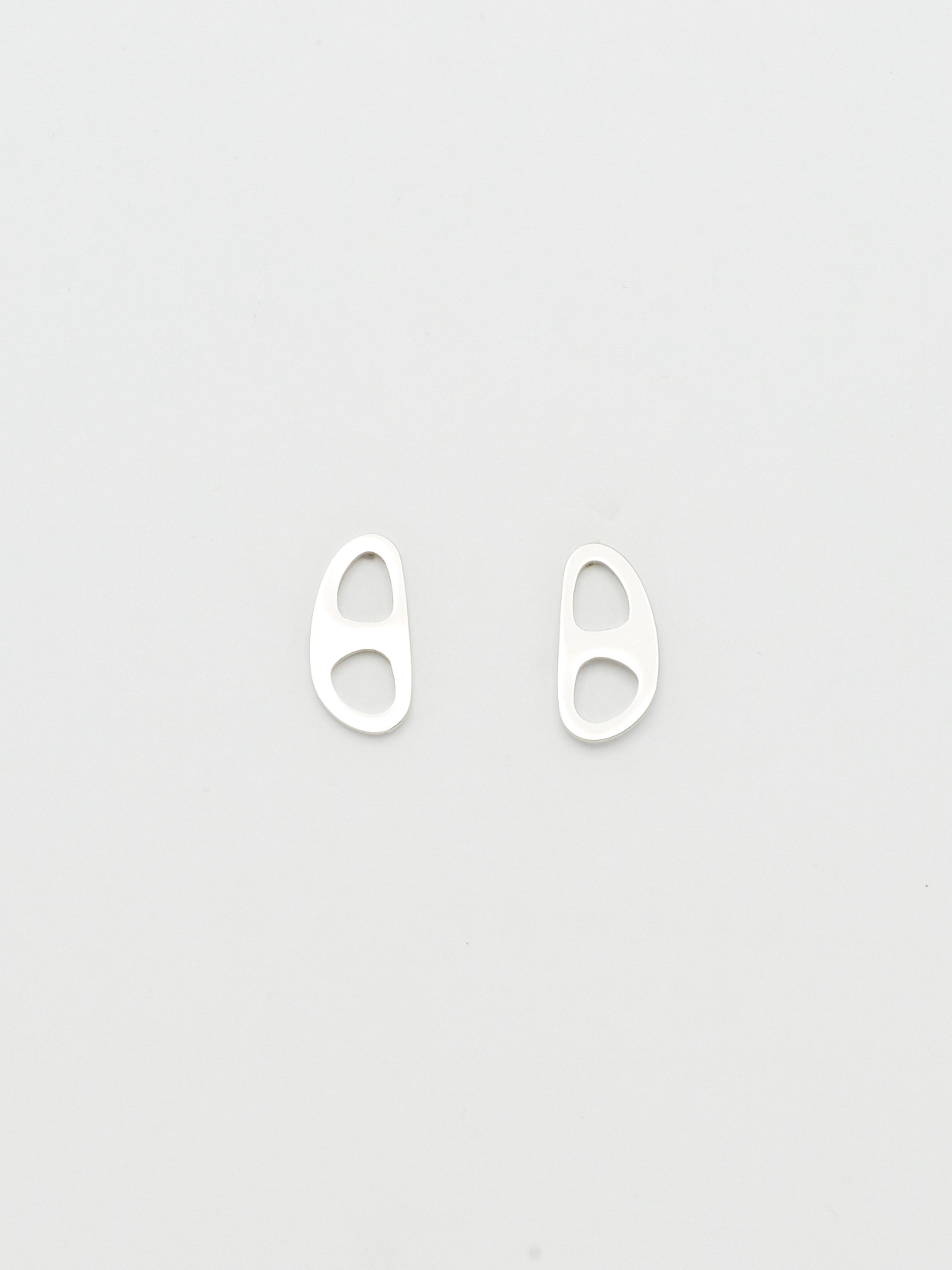 Overhead flat lay view of the Silver Tab Studs Earrings bagatiba 