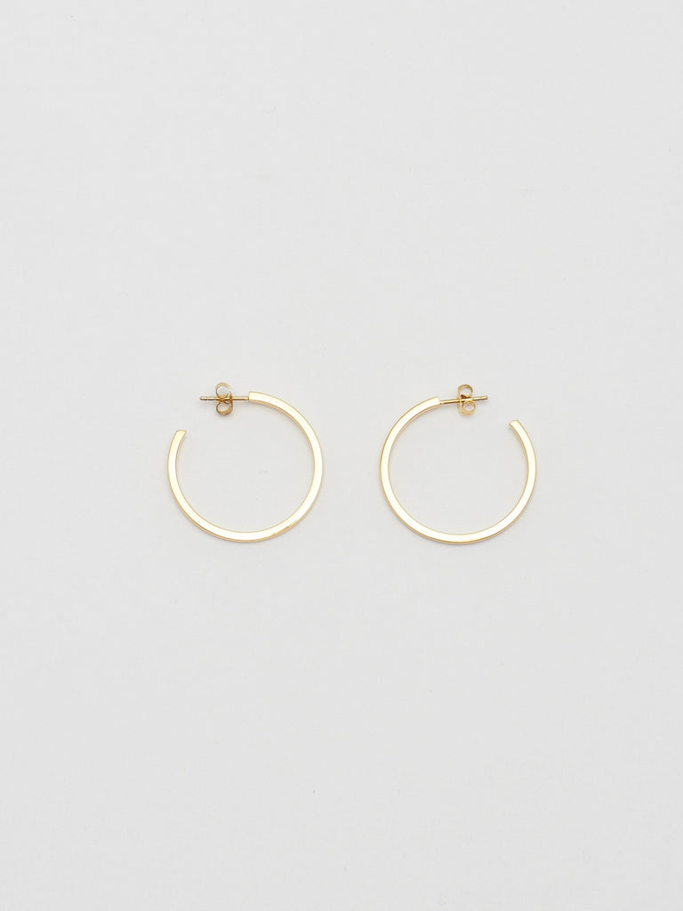 Full view flat lay of Simple Gold Hoops Earrings Bagatiba 