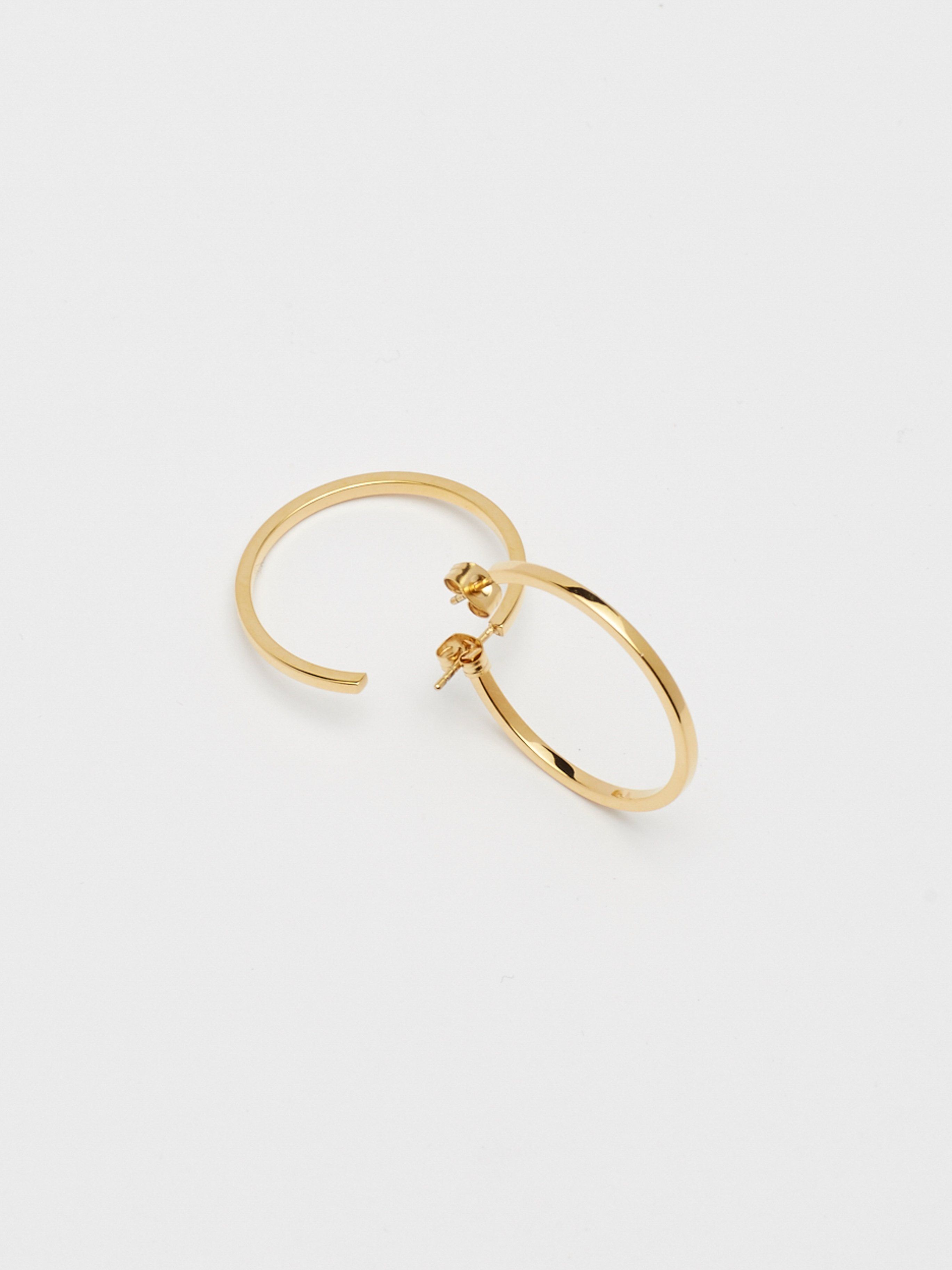 Detail flat lay of Simple Gold Hoops Earrings Bagatiba 