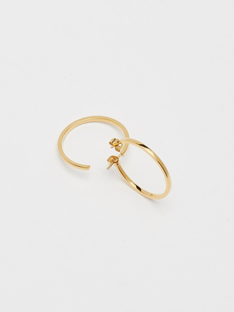 Detail flat lay of Simple Gold Hoops Earrings Bagatiba 