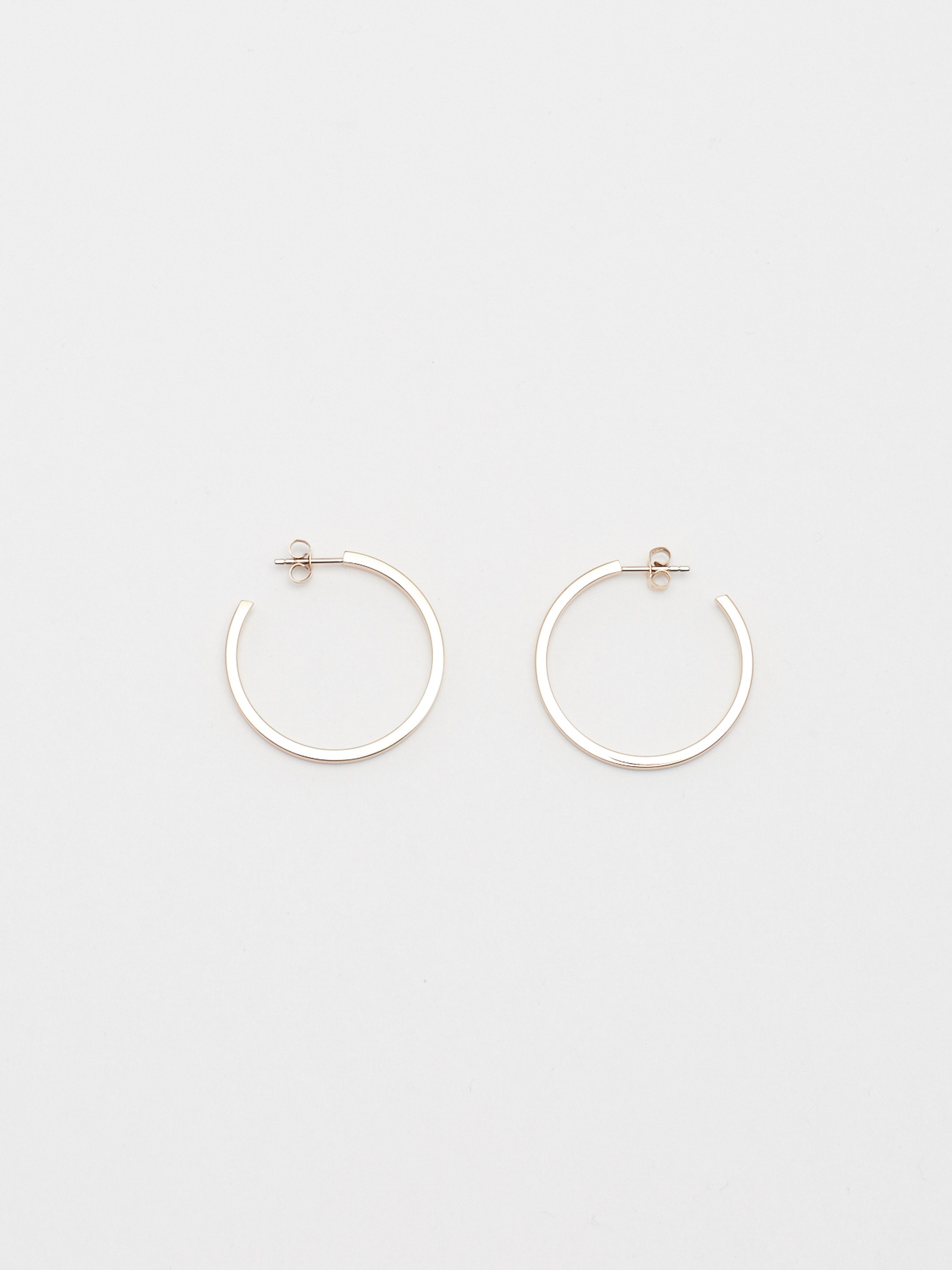 Full view flat lay of Simple Rose Gold Hoops Earrings Bagatiba 
