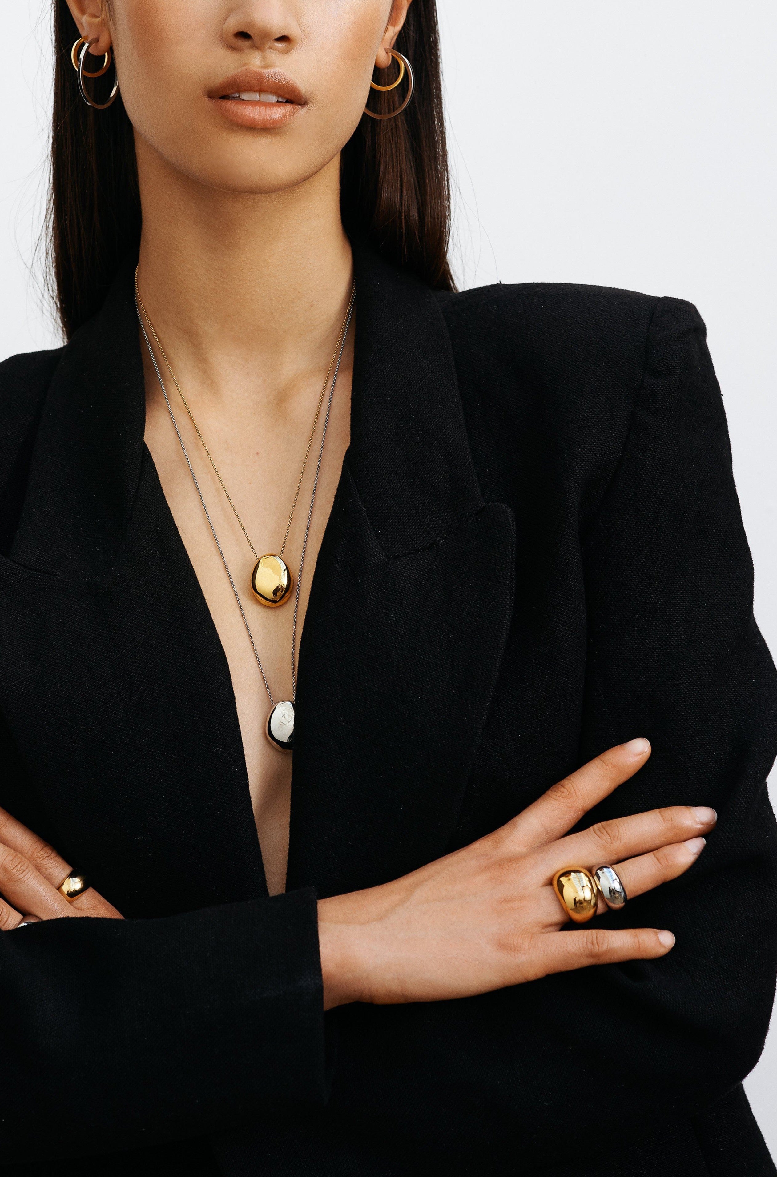 Full view of model wearing the Simple Silver Hoops Earrings and other styles by  Bagatiba 