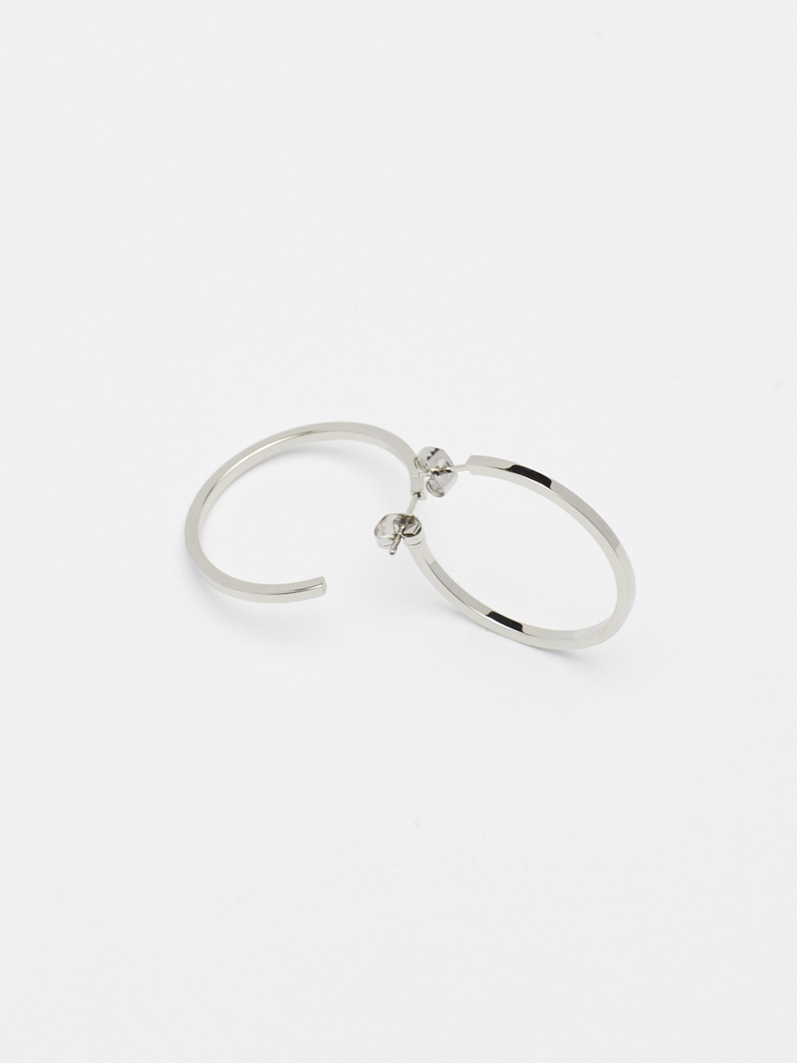 Detailed flat lay of Simple Silver Hoops Earrings Bagatiba 