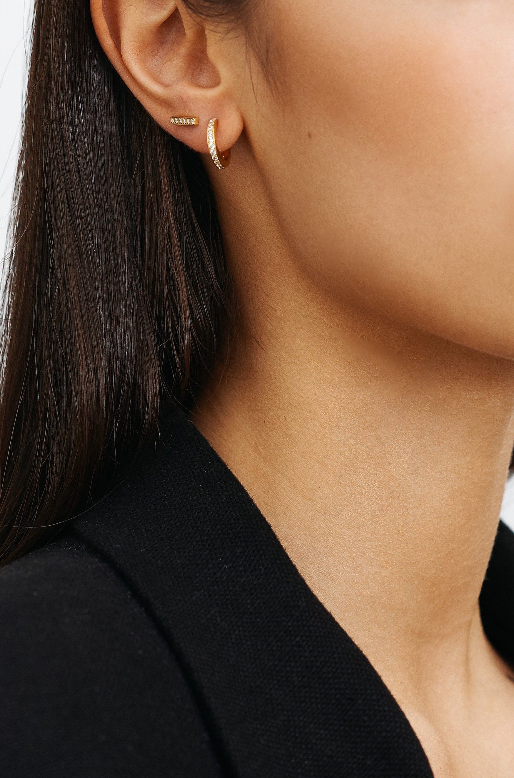 Model profile view of the Small Diamond Hoops Earrings Bagatiba 