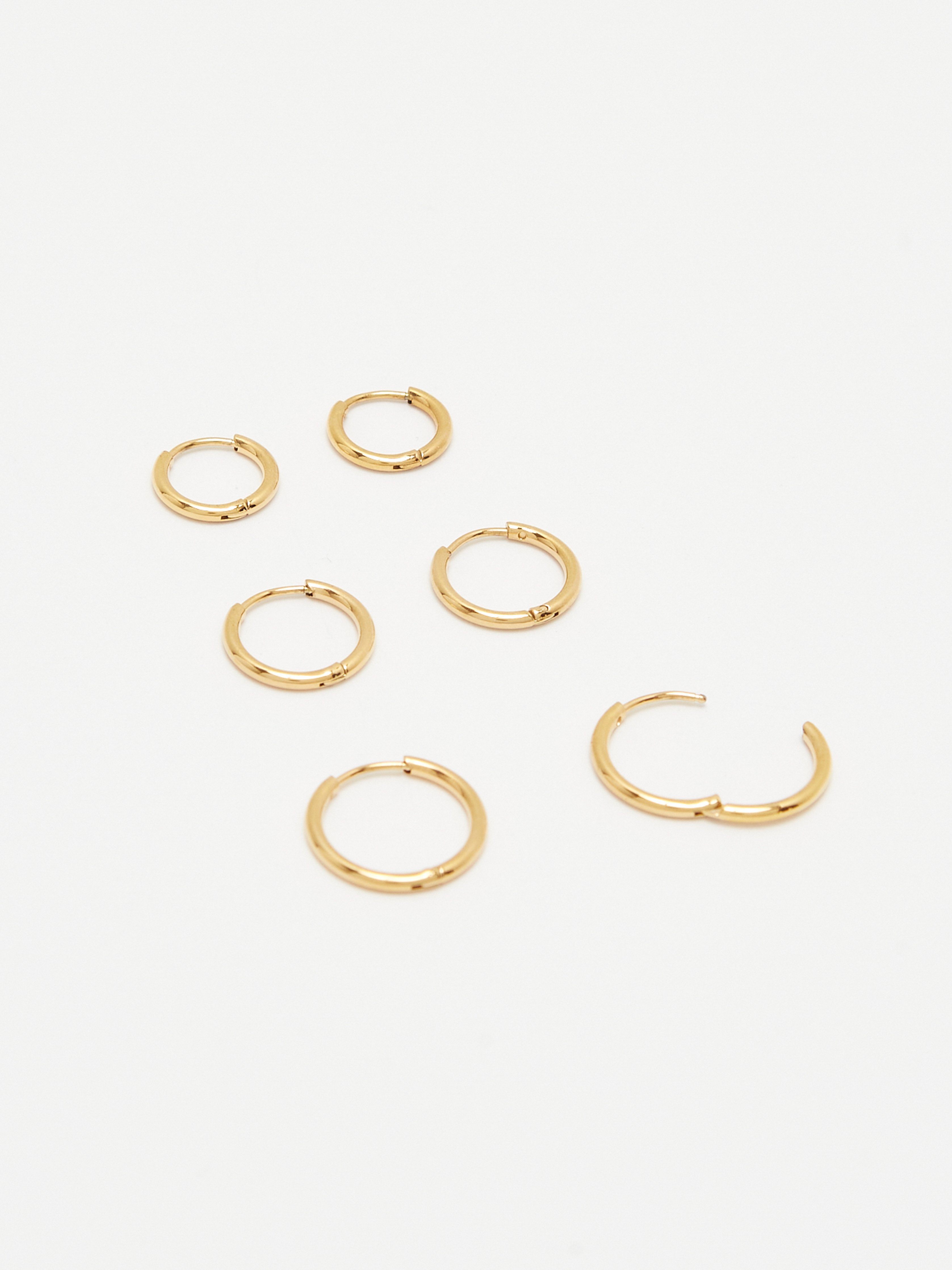 Full view flat lay of the Gold Eco Huggies Set Earrings Bagatiba 