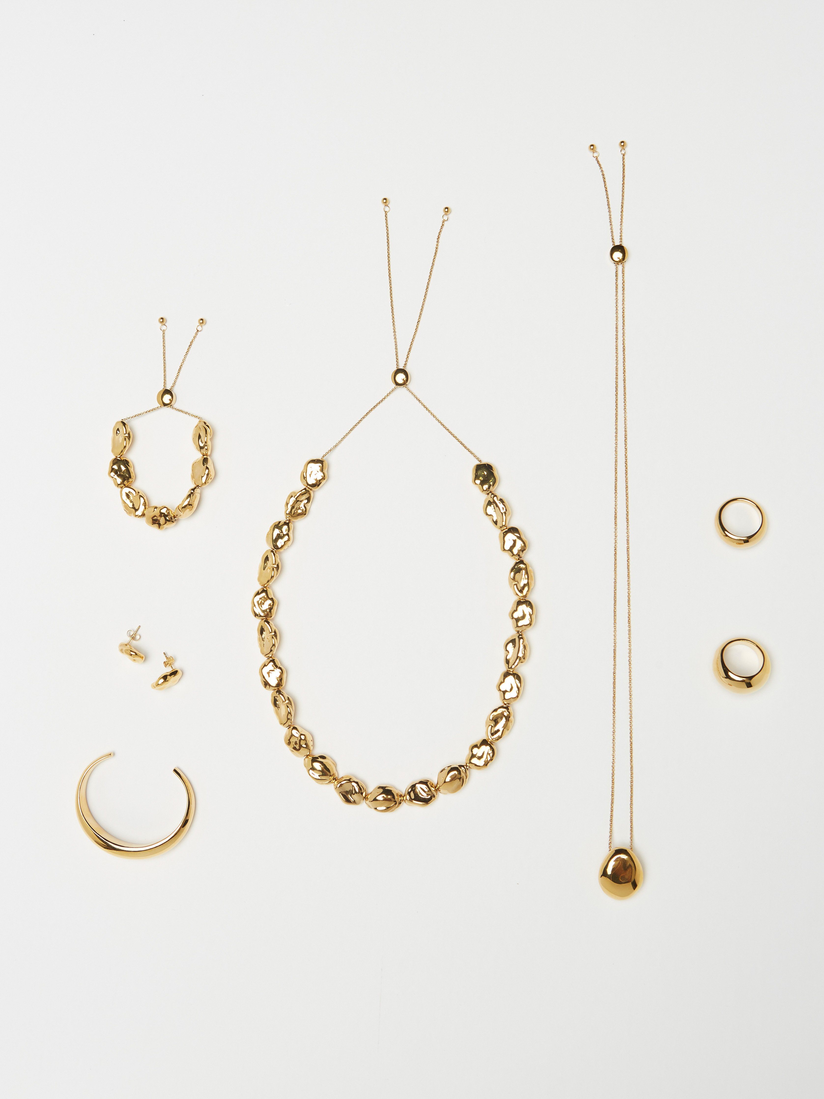 Full view flat lay of the Orb Collection including the Small Gold Orb Ring Ring bagatiba 