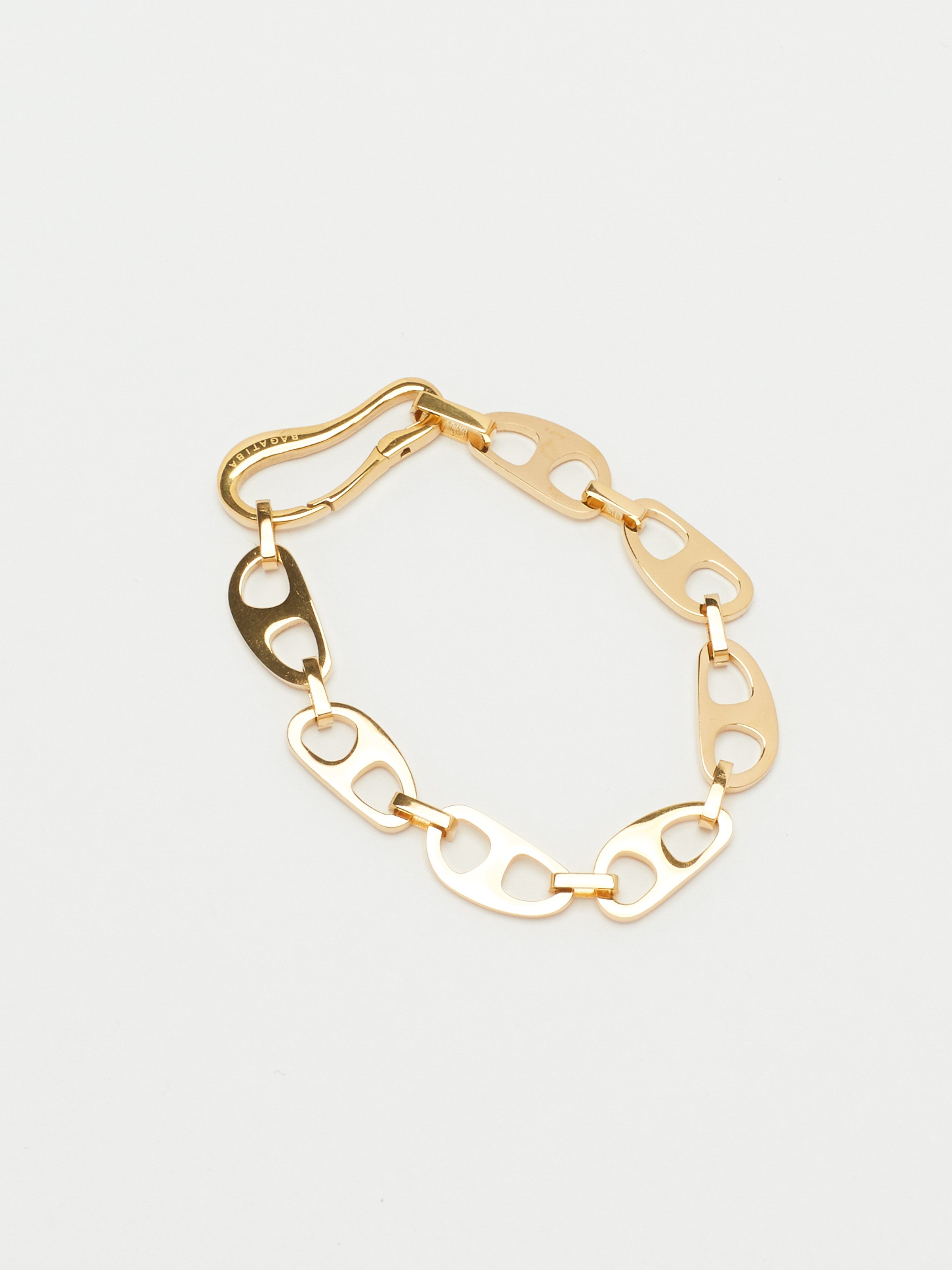 Detailed flat lay view of Small Gold Tab Bracelet Necklace bagatiba 