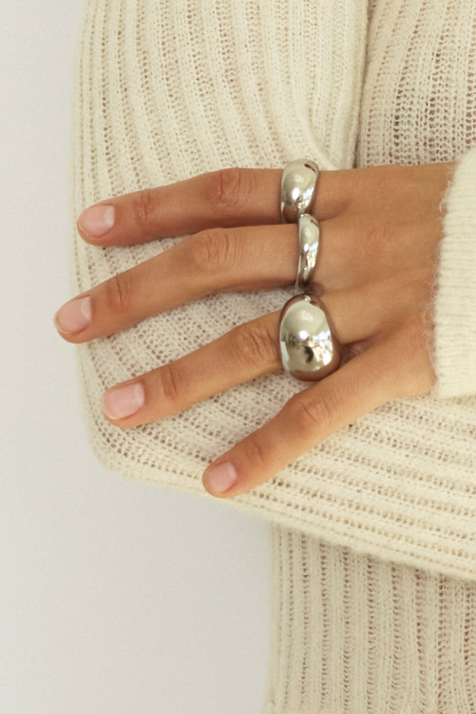 Large, Small and Thin Silver Orb Rings by bagatiba shown on model's hand