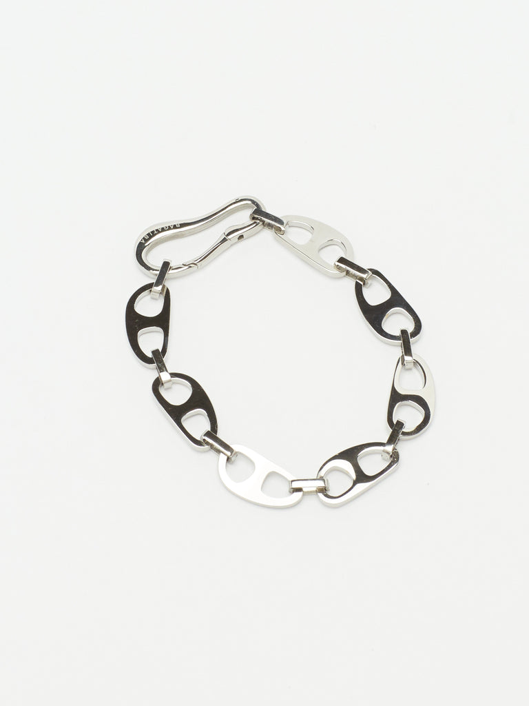 Cropped flat lay of Small Silver Tab Bracelet Necklace bagatiba 