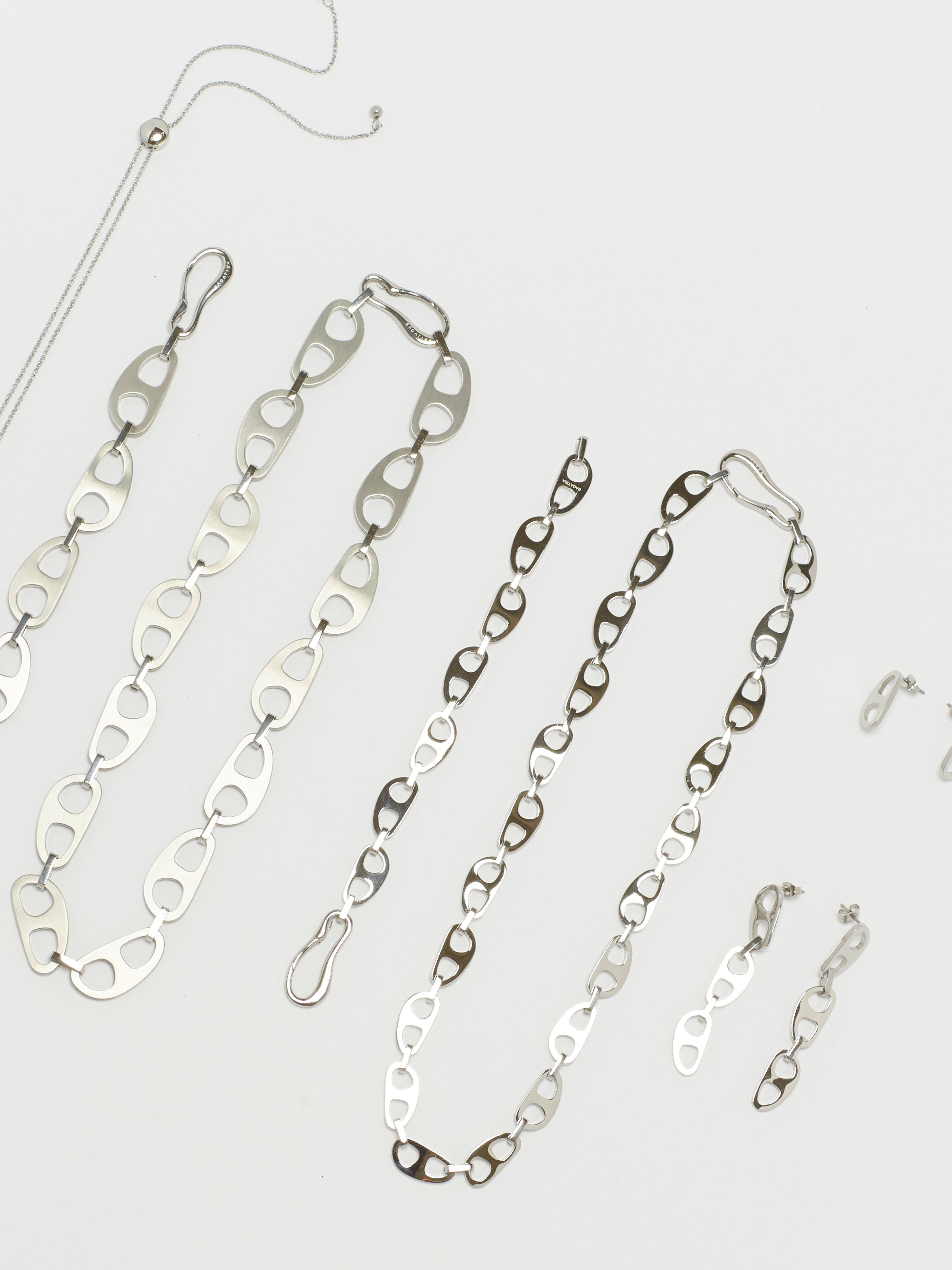 Cropped flat lay view of Small Silver Tab Necklace Necklace bagatiba 