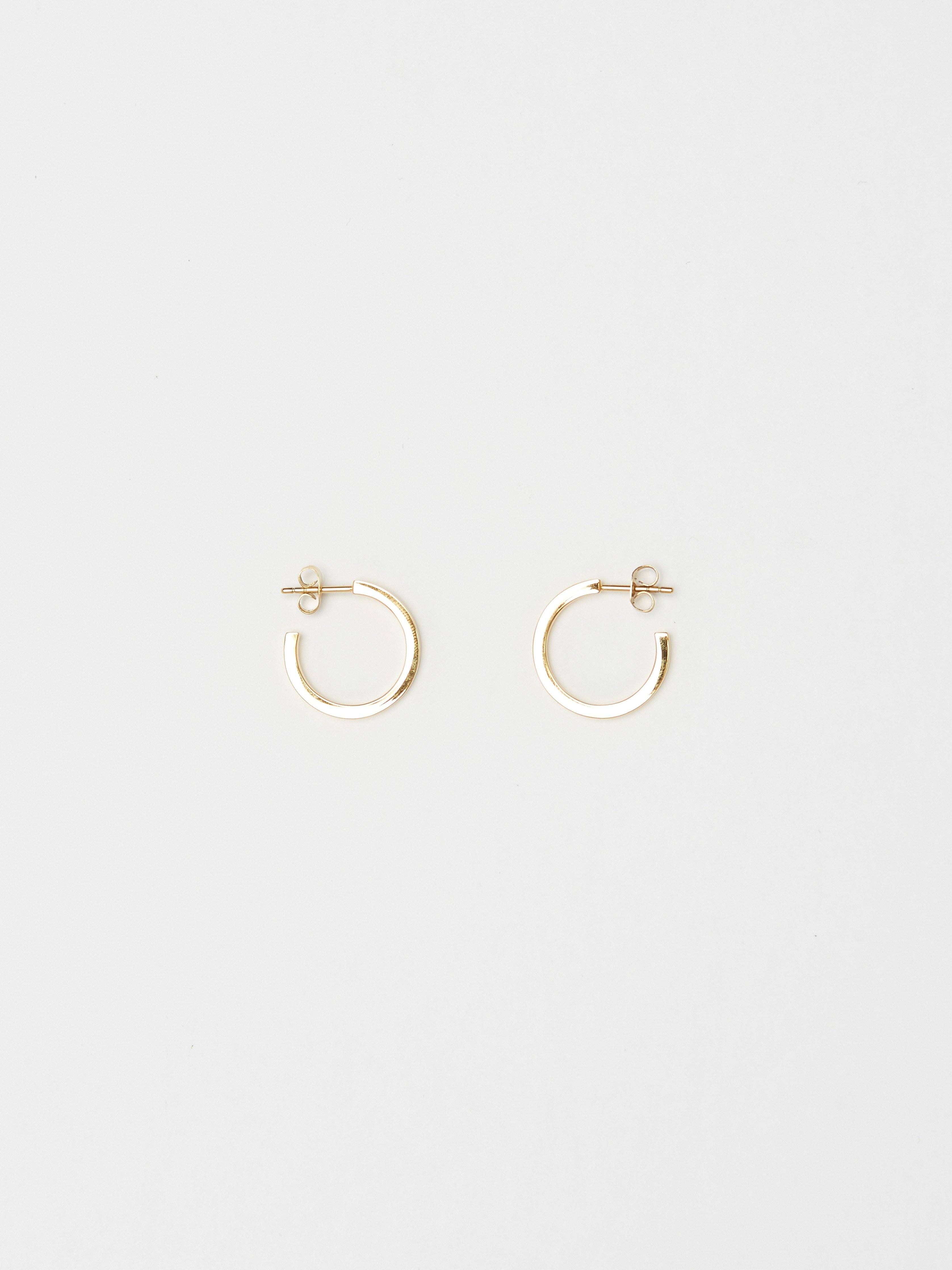 Full view flat lay of the Small Simple Gold Hoops Earrings Bagatiba 