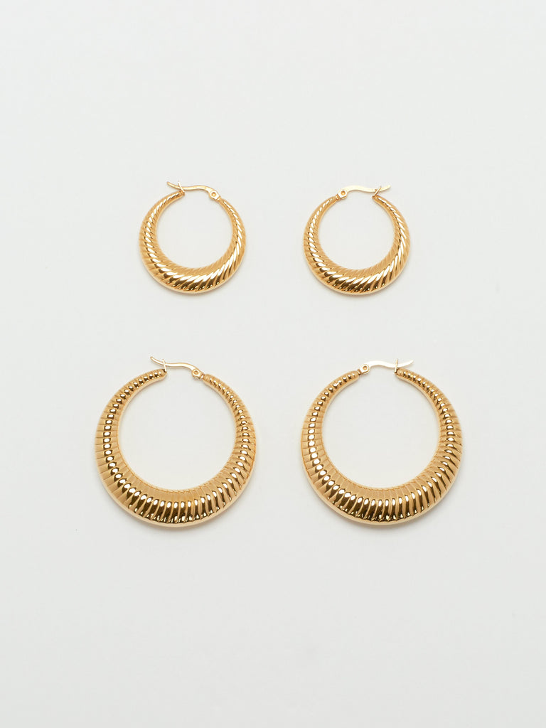 Full view flat lay of the Small Spiral Hoops and Spiral Hoops by bagatiba 