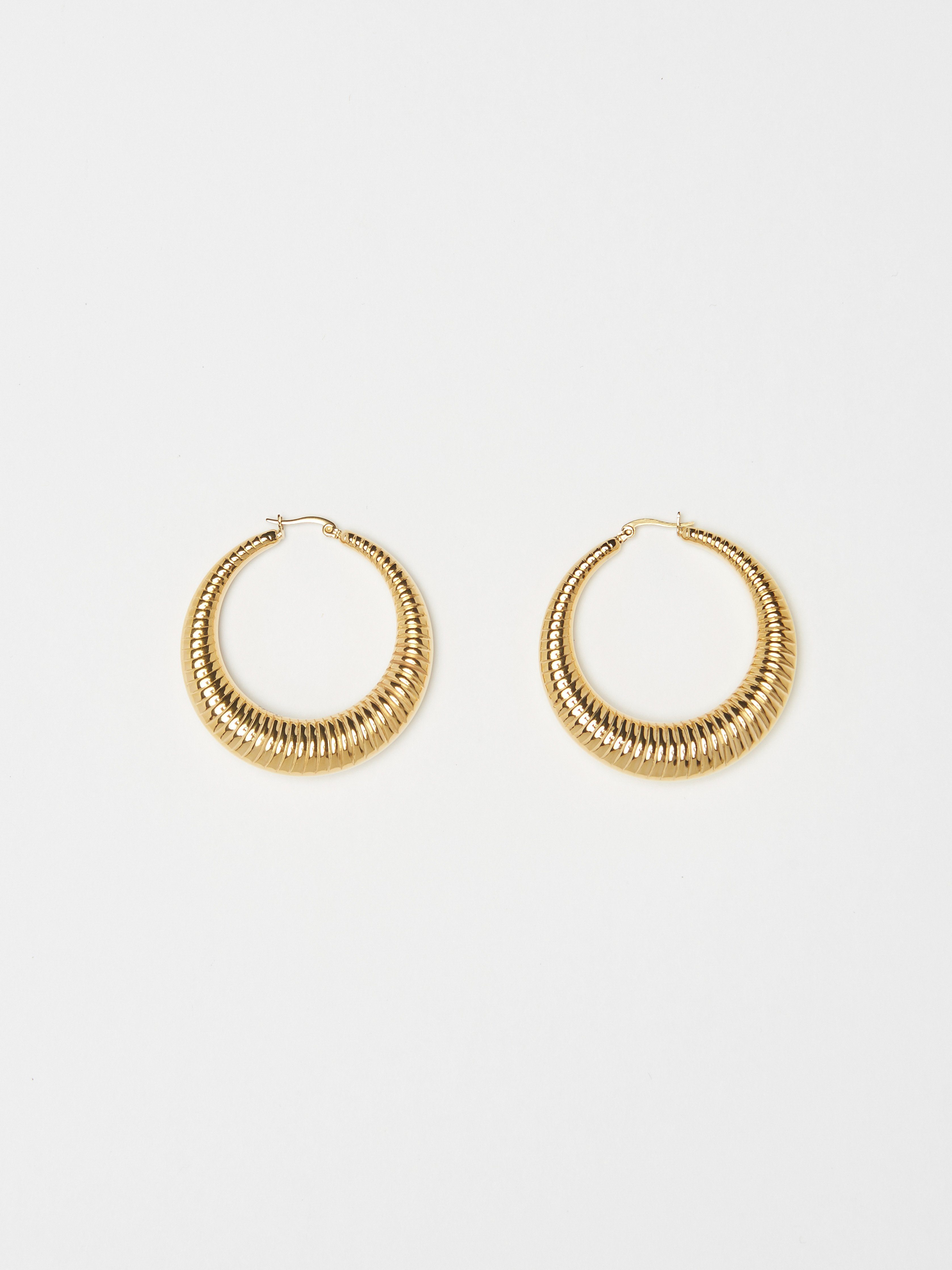 Flat lay view of the Spiral Hoops Earrings bagatiba 