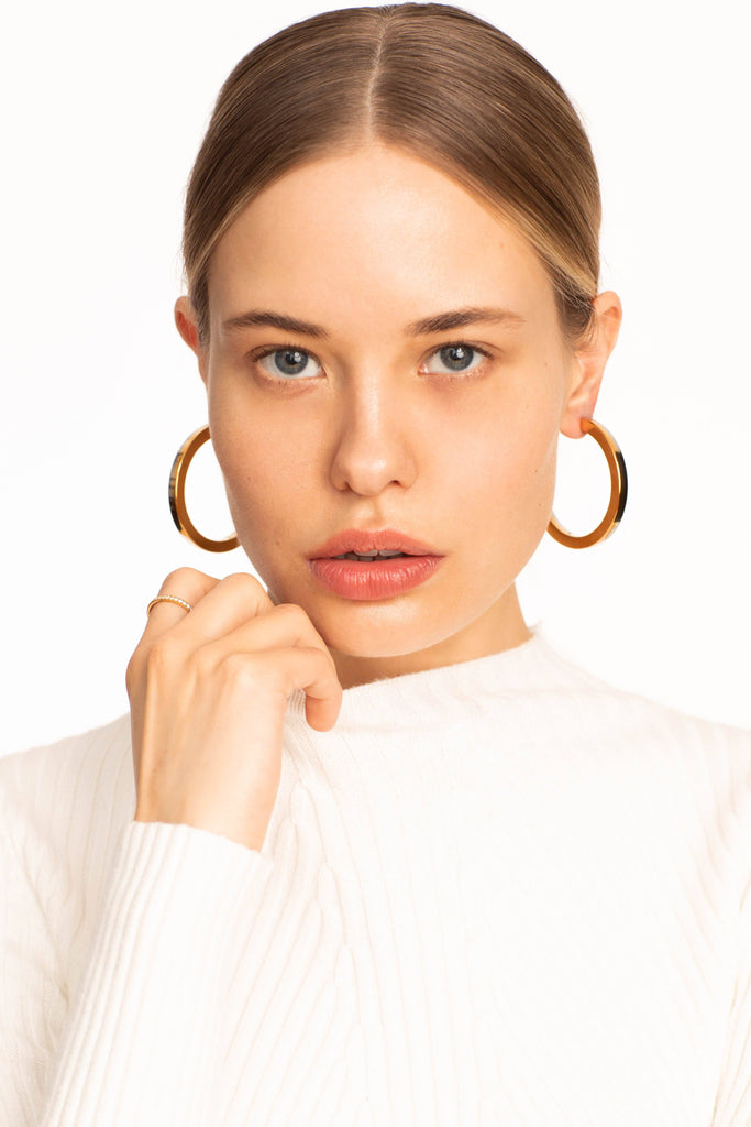 Close view profile of model in the Two Tone Flat Hollow Hoops Earrings Bagatiba 