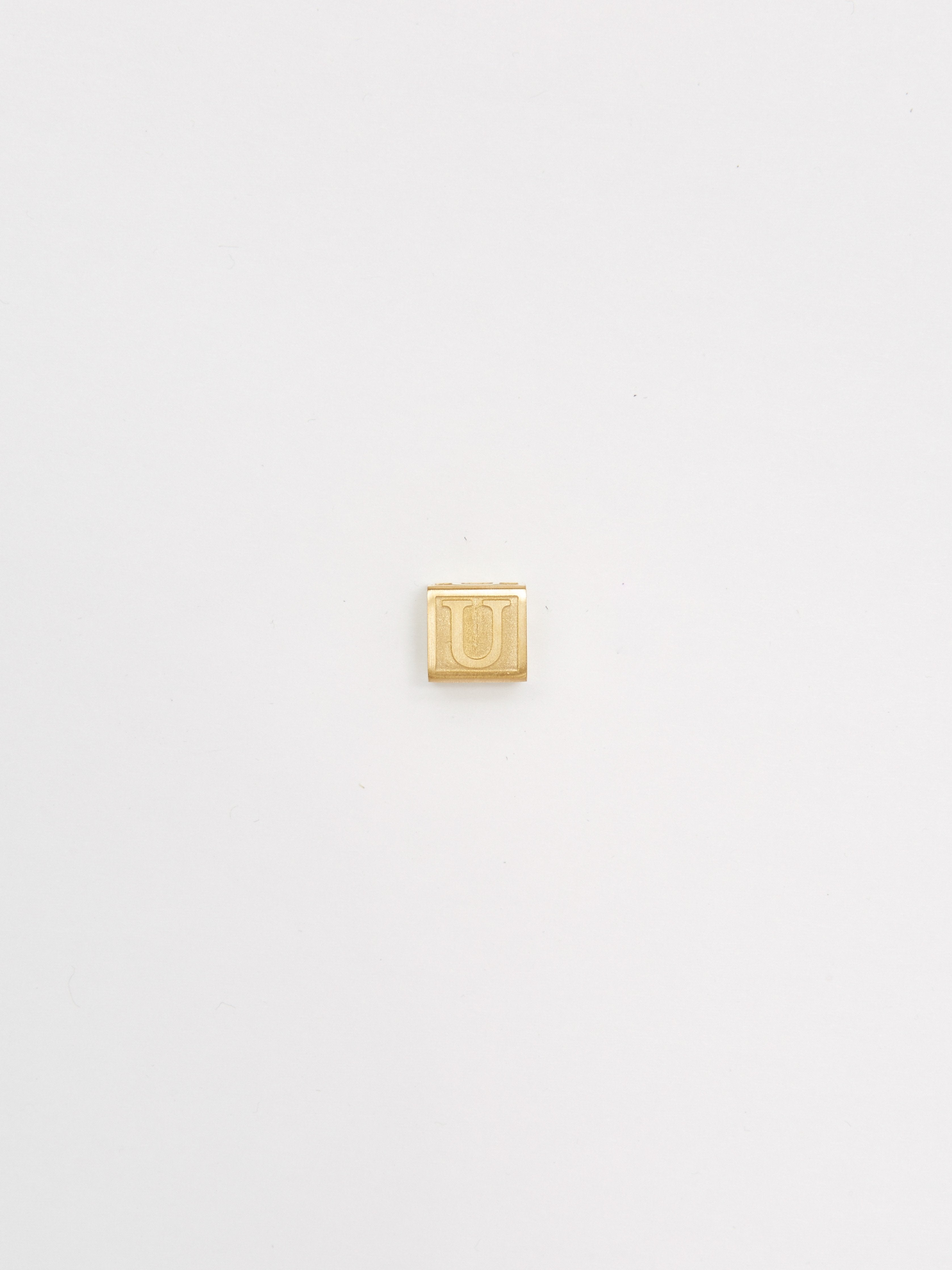 Full view flat lay of "U" Letter Block letters Bagatiba 