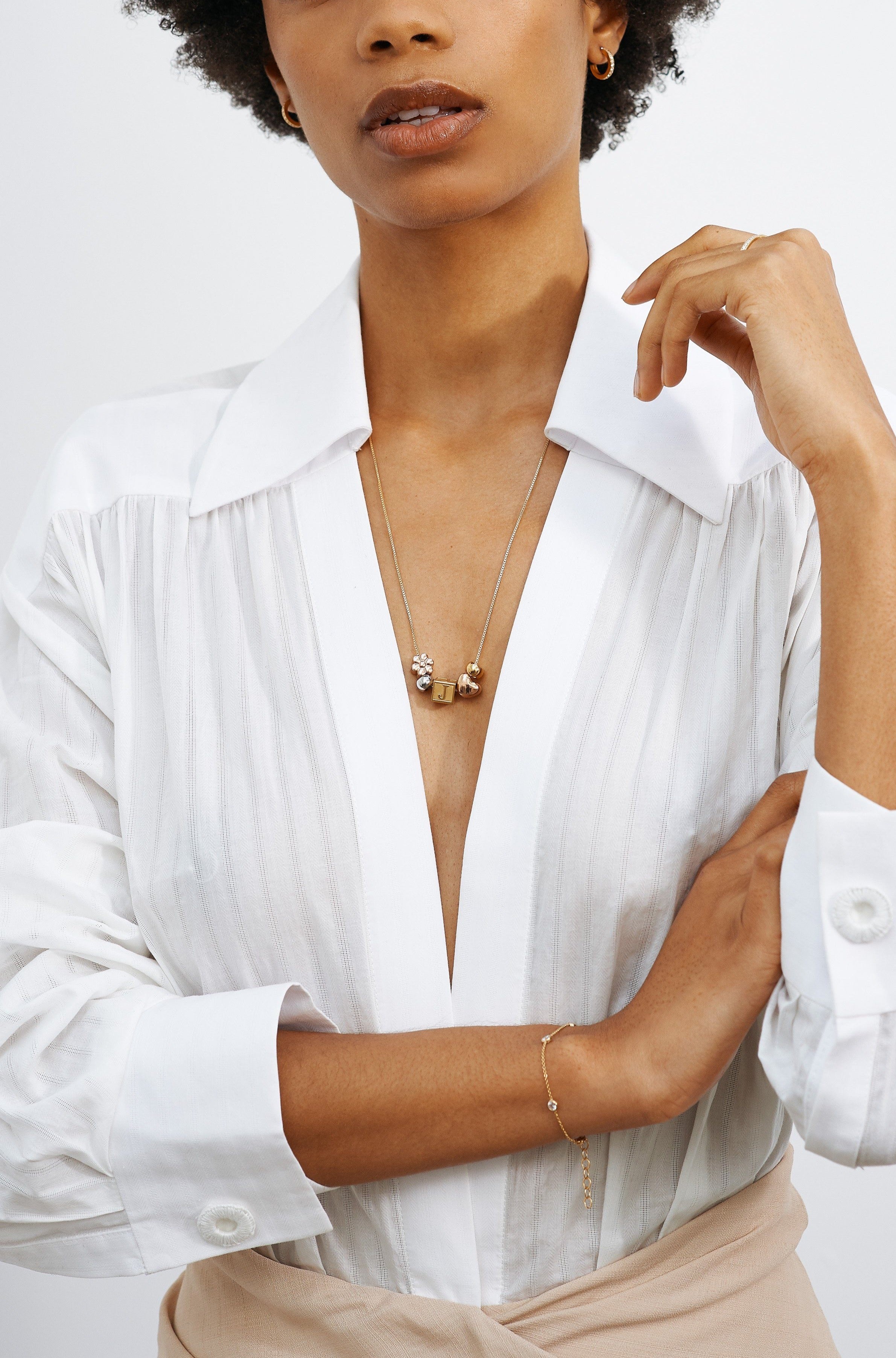 Full view of model wearing "W" Letter Block letter mixed with bead set on 22" chain  Bagatiba 