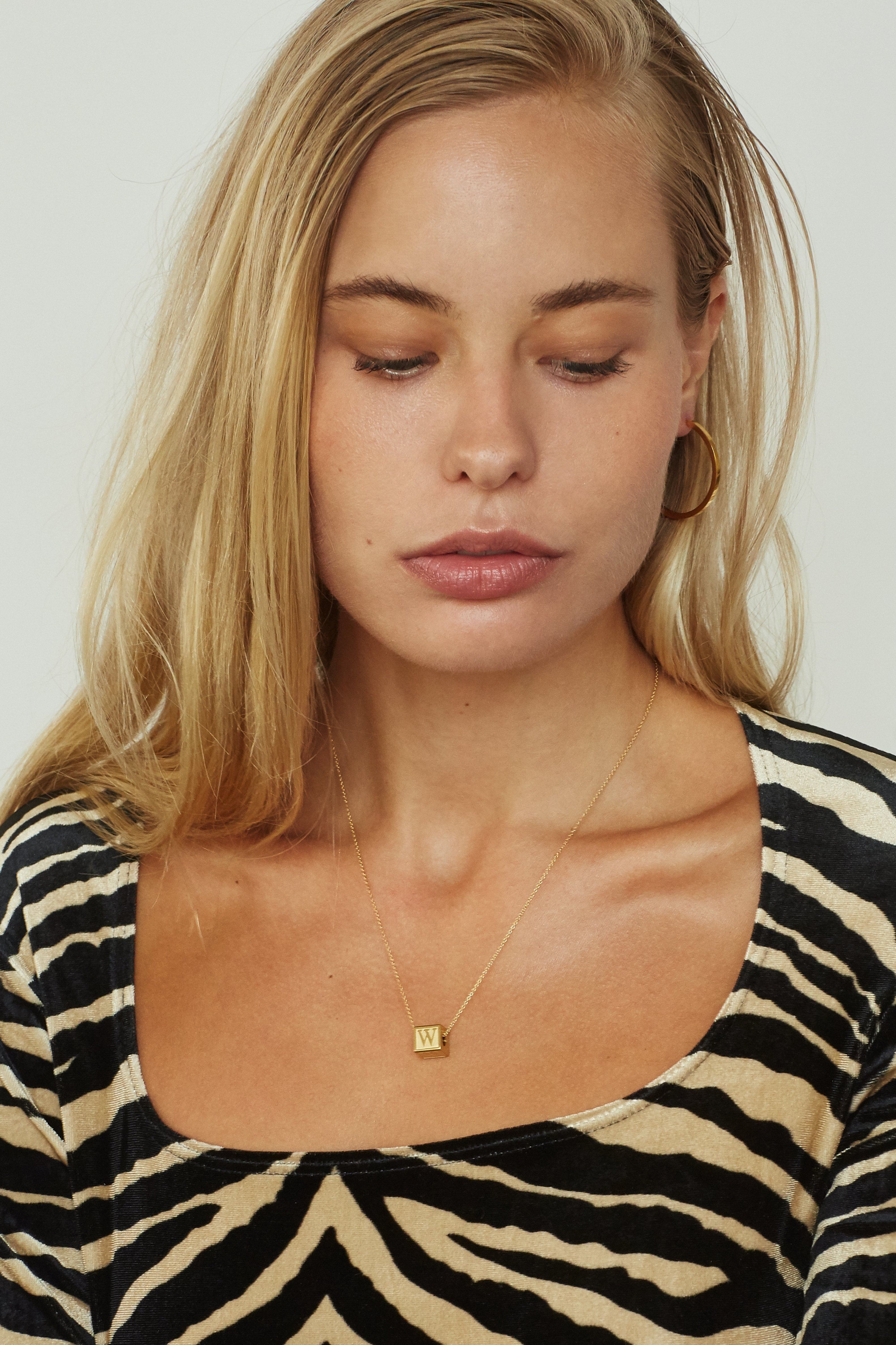 Model wearing "W" Letter Block letters on chain  Bagatiba 